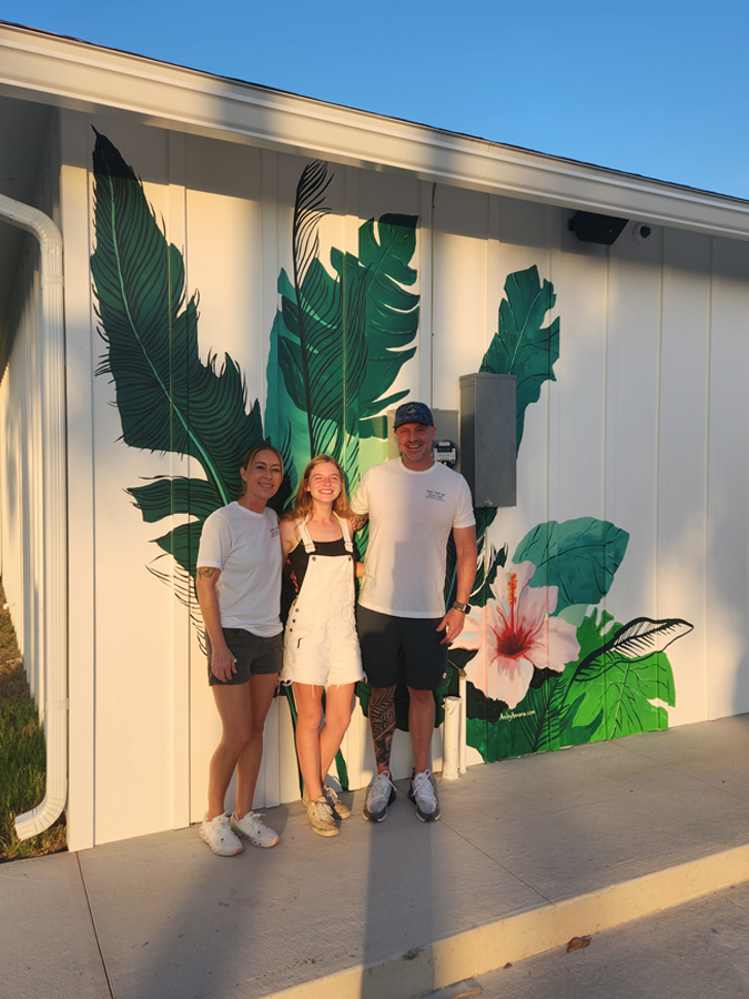The owners of Sand Trap Jax and I in front of their new rad mural!
