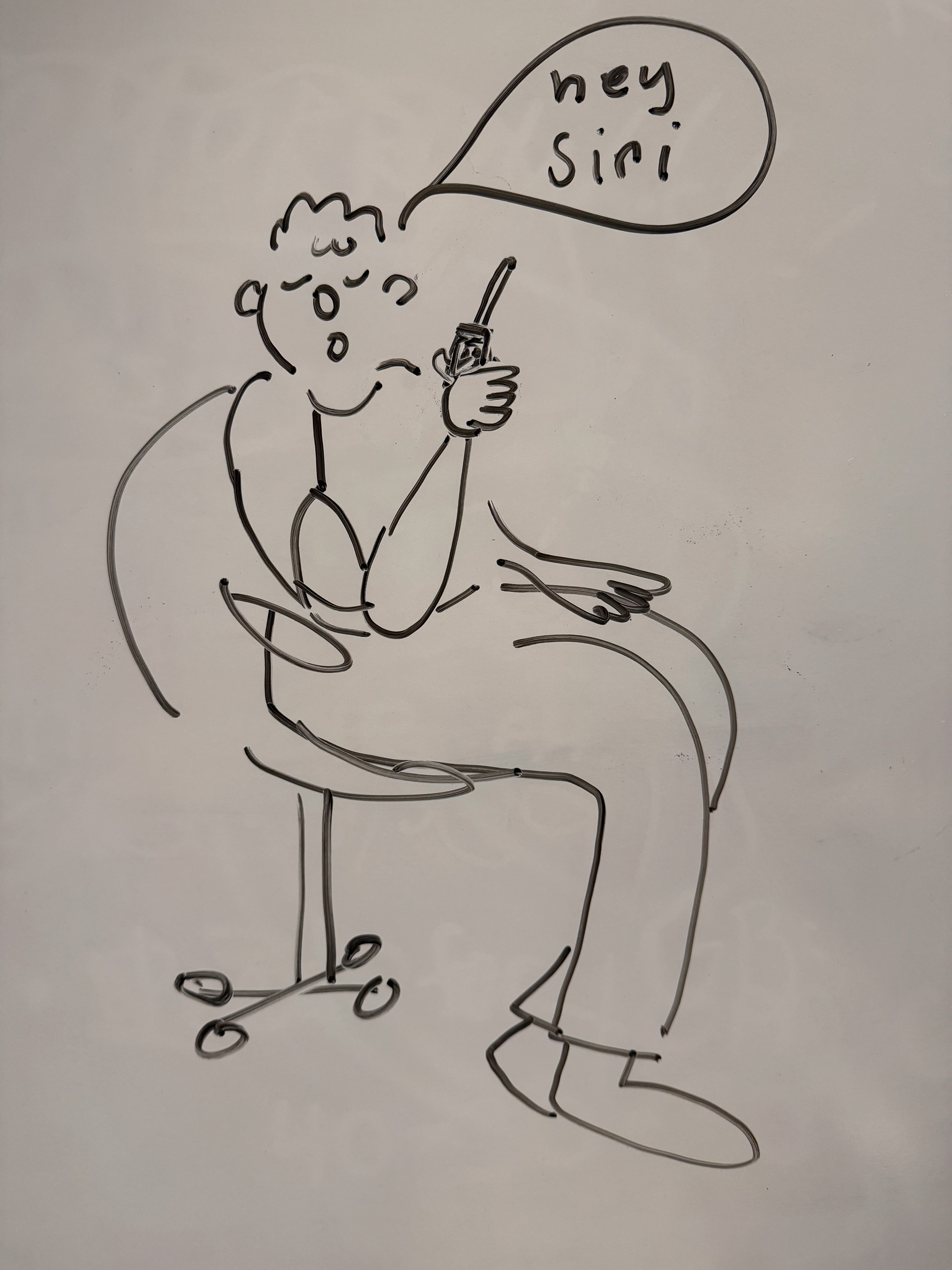 figure sitting in rolling chair, holding walkie-talkie up to mouth with the talk bubble filled in with the words, hey Siri