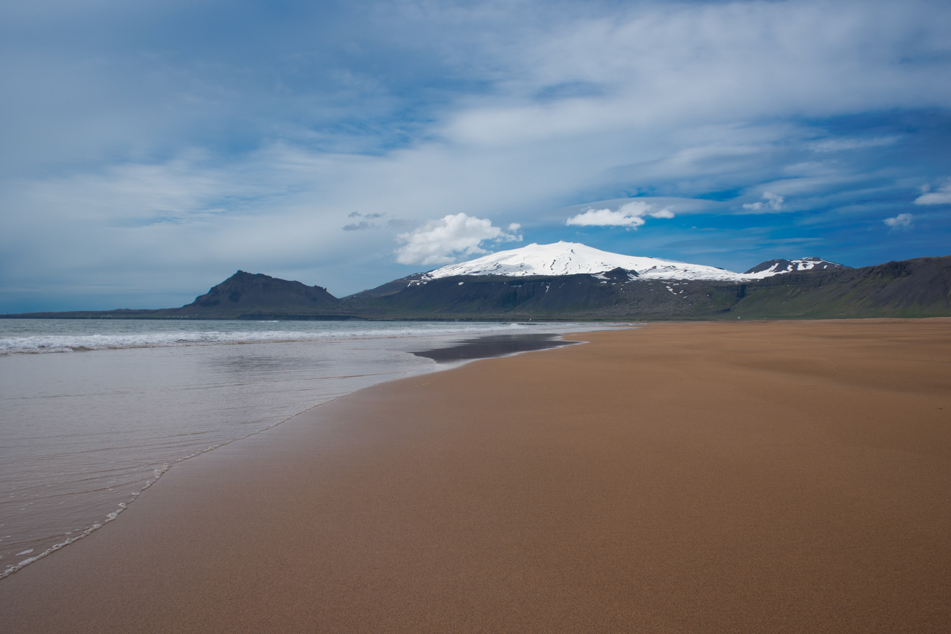 ©SVANA A view from Breiðavík towards the Snæfellsjökull glacier; from where one can make a journey to the centre of the Earth (according to Jules Verne).Location: Breiðavík, Snæfellsnes, West Iceland.