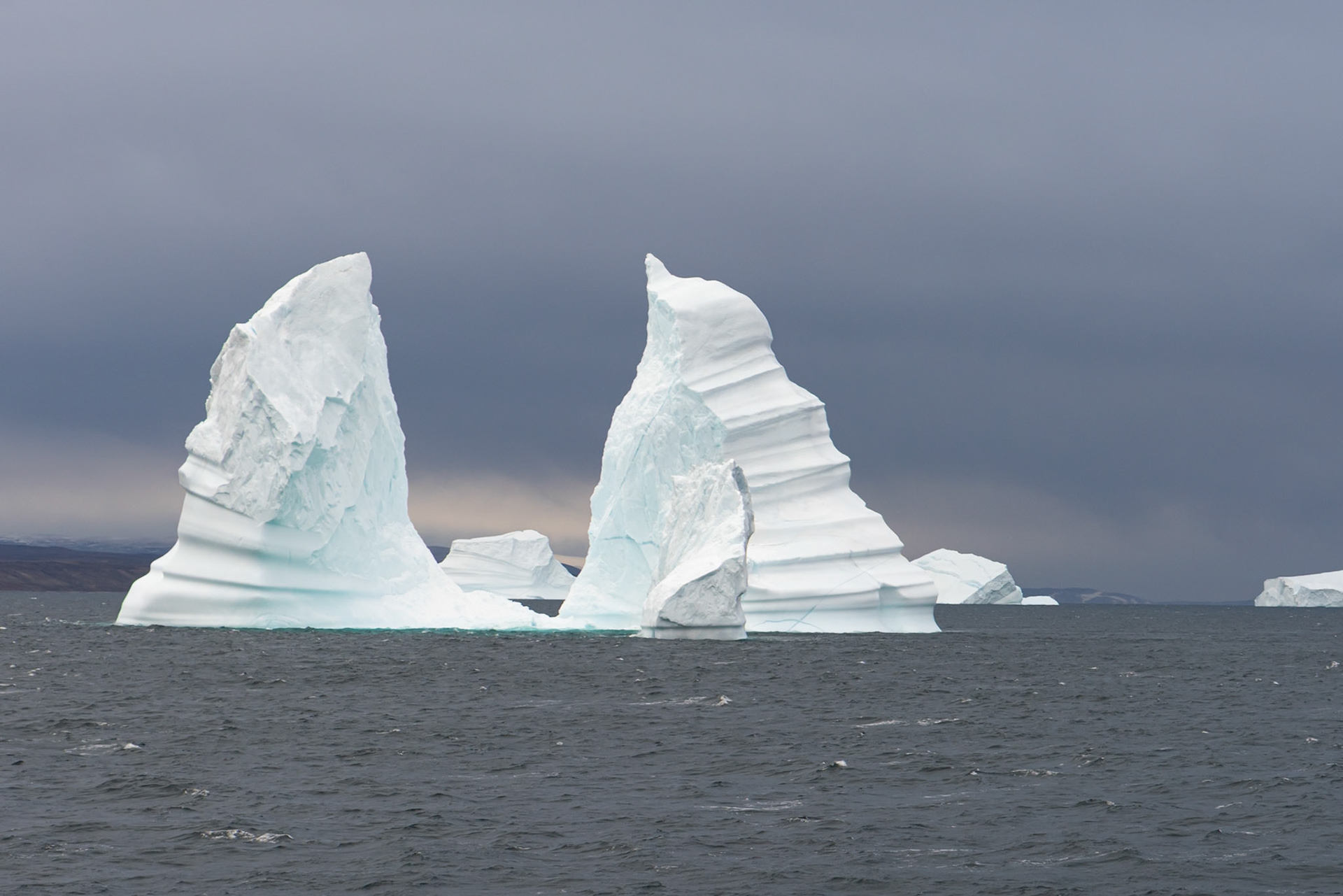 ©SVANA  Magnificent icebergs in Scoresby Sound, East Greenland, with differentshapes and colours. Somehow hard to imagine that only one tenth is abovethe water.