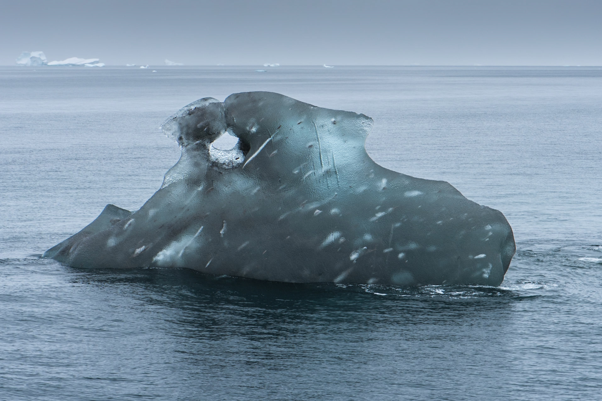 ©SVANA  Magnificent icebergs in Scoresby Sound, East Greenland, with differentshapes and colours. Somehow hard to imagine that only one tenth is abovethe water.