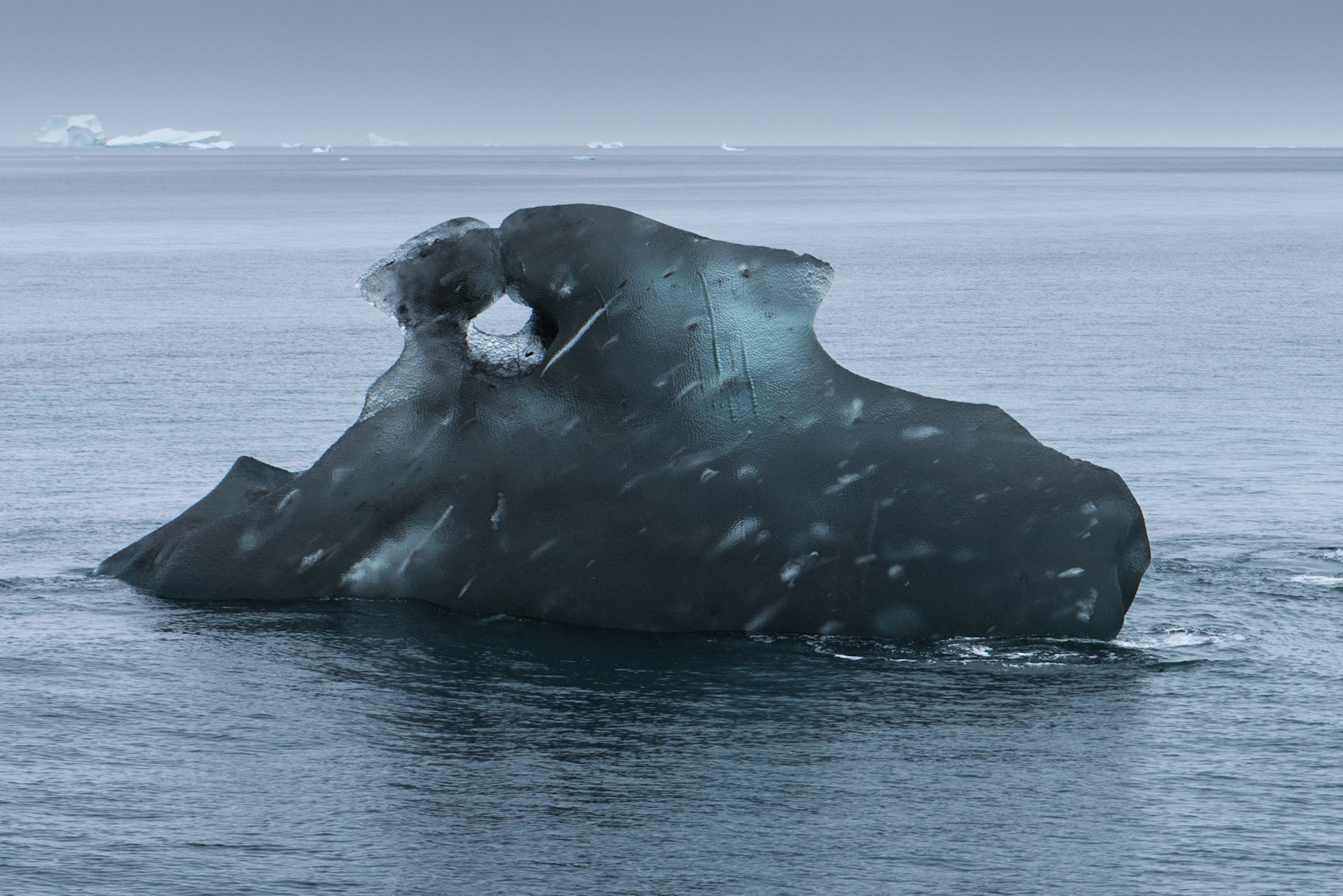 ©SVANA  Magnificent icebergs in Scoresby Sound, East Greenland, with differentshapes and colours. Somehow hard to imagine that only one tenth is abovethe water.