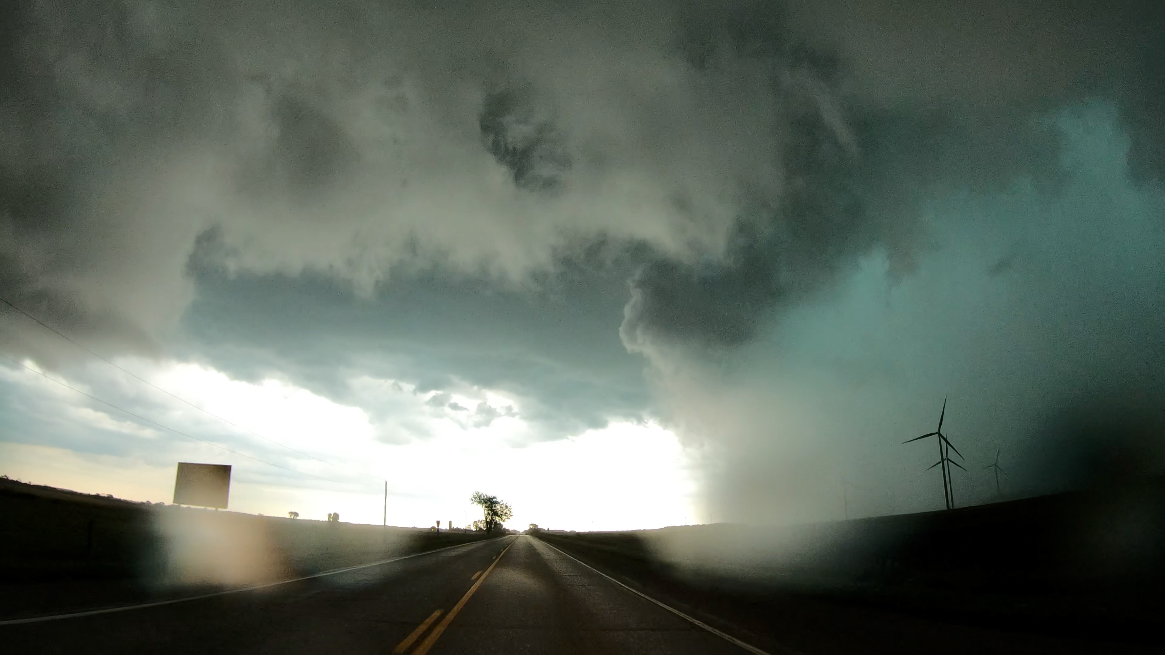 Video frame grab of the rain-wrapped circulation about to cross Huron County Rd. 86