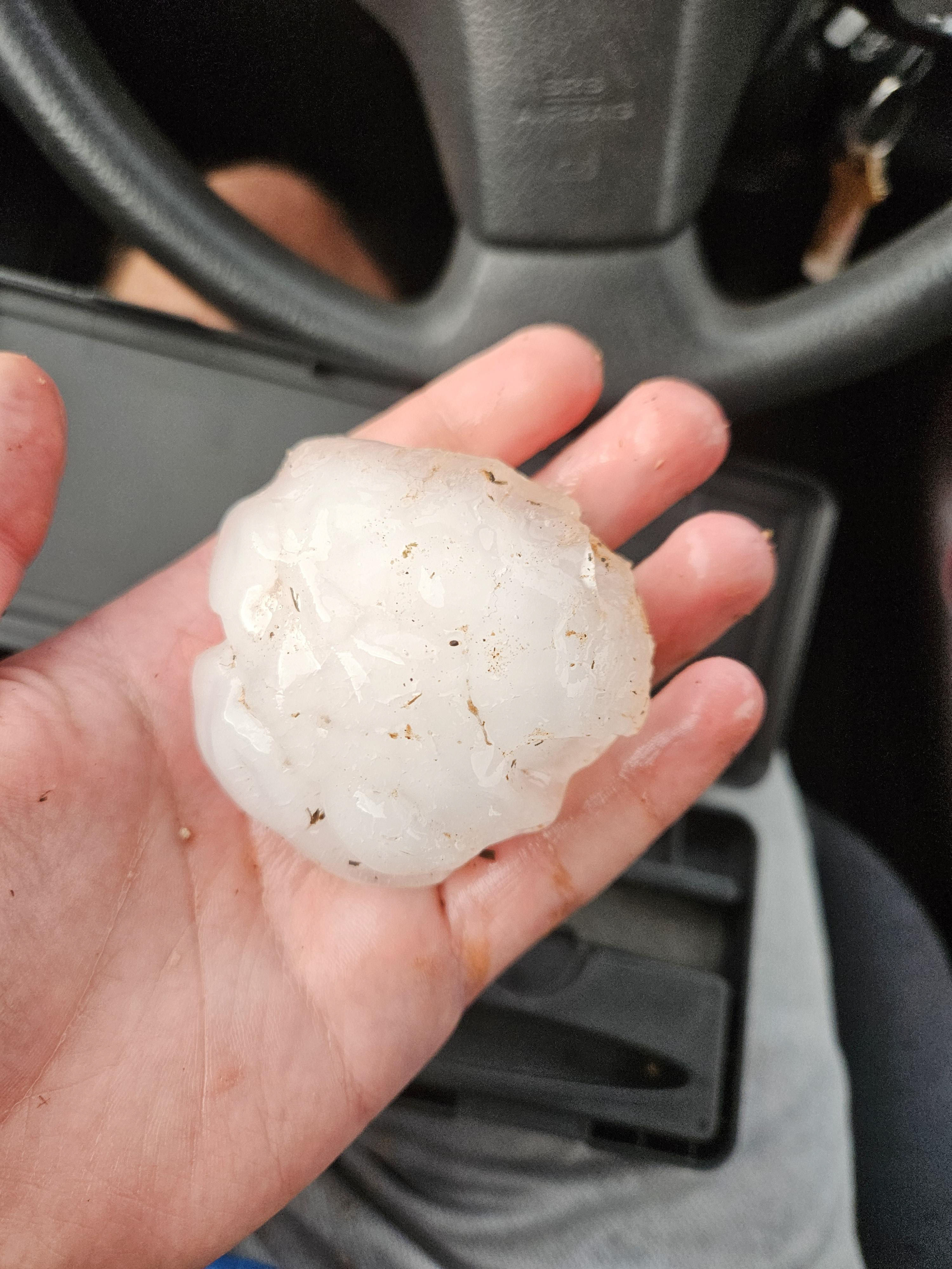 Sampling huge hail left on the ground near Levelland, TX