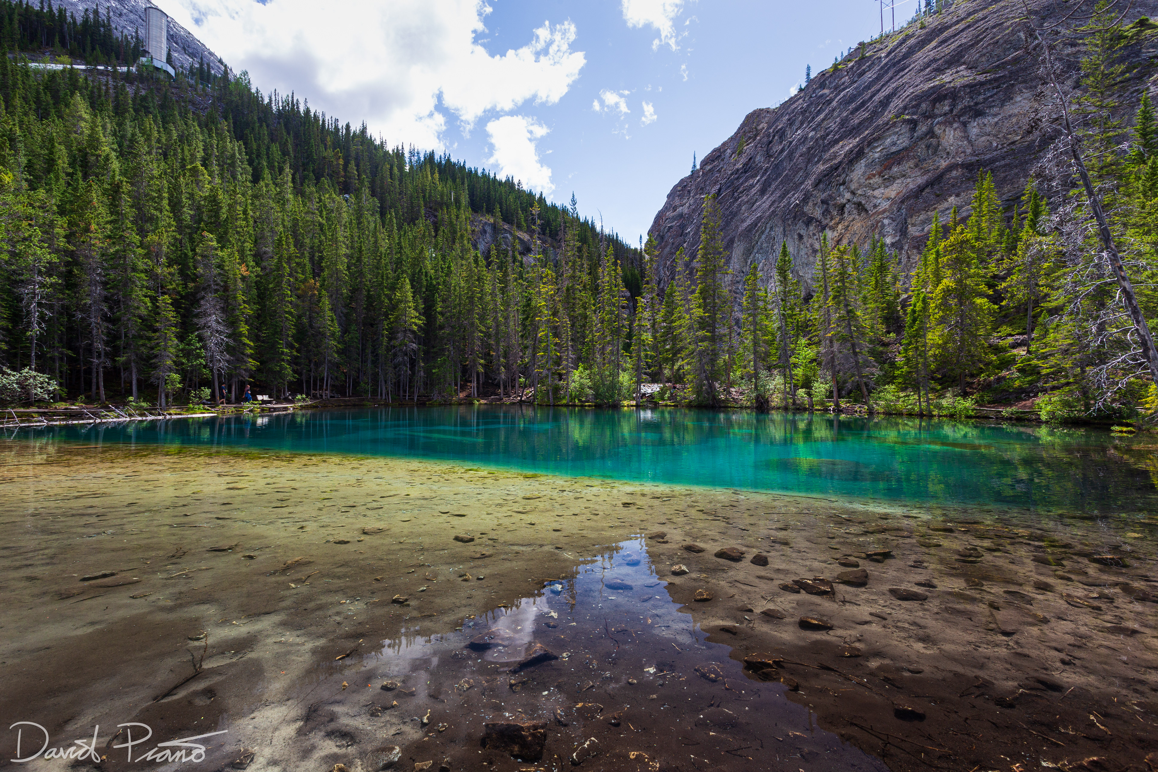 The crystal-clear emerald waters of the Grassi Lakes in Canmore, AB - June 2021
