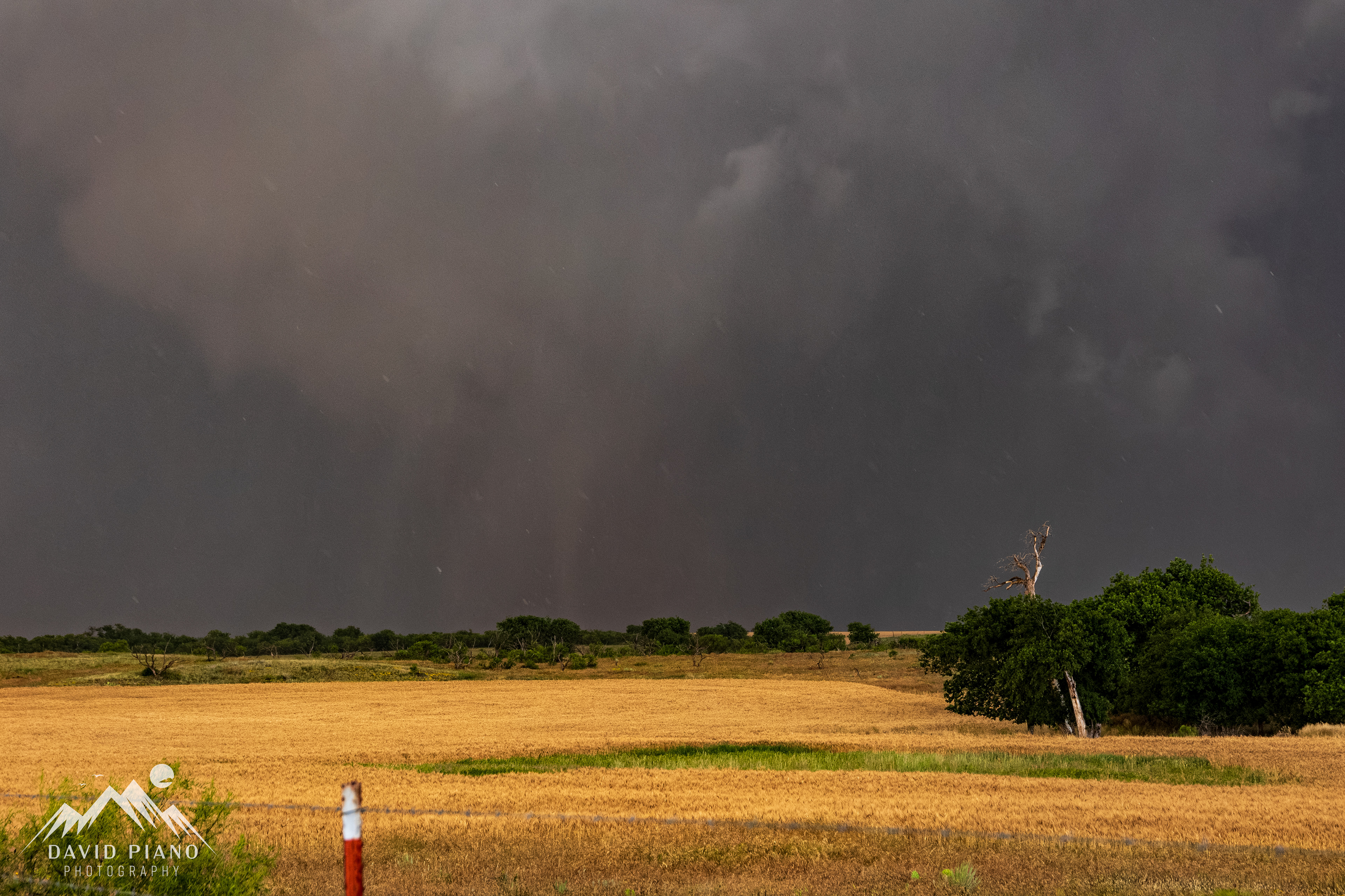 Hailstones whip around the backside of the tornado/mesocyclone