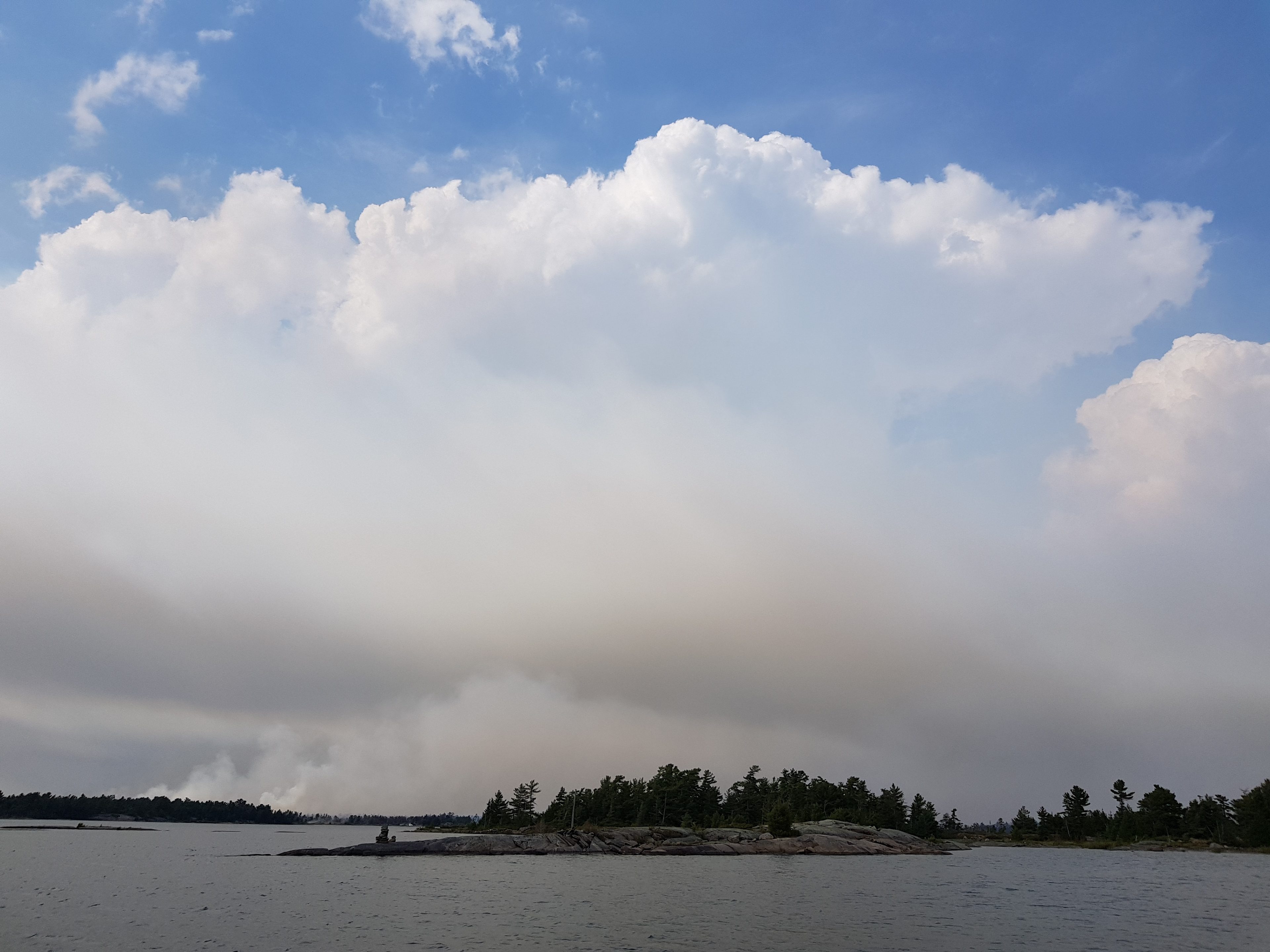 Pyrocumulus is generated by the intense thermals over the wildfire - Parry Sound 33 Forest Fire - 07/21/2018