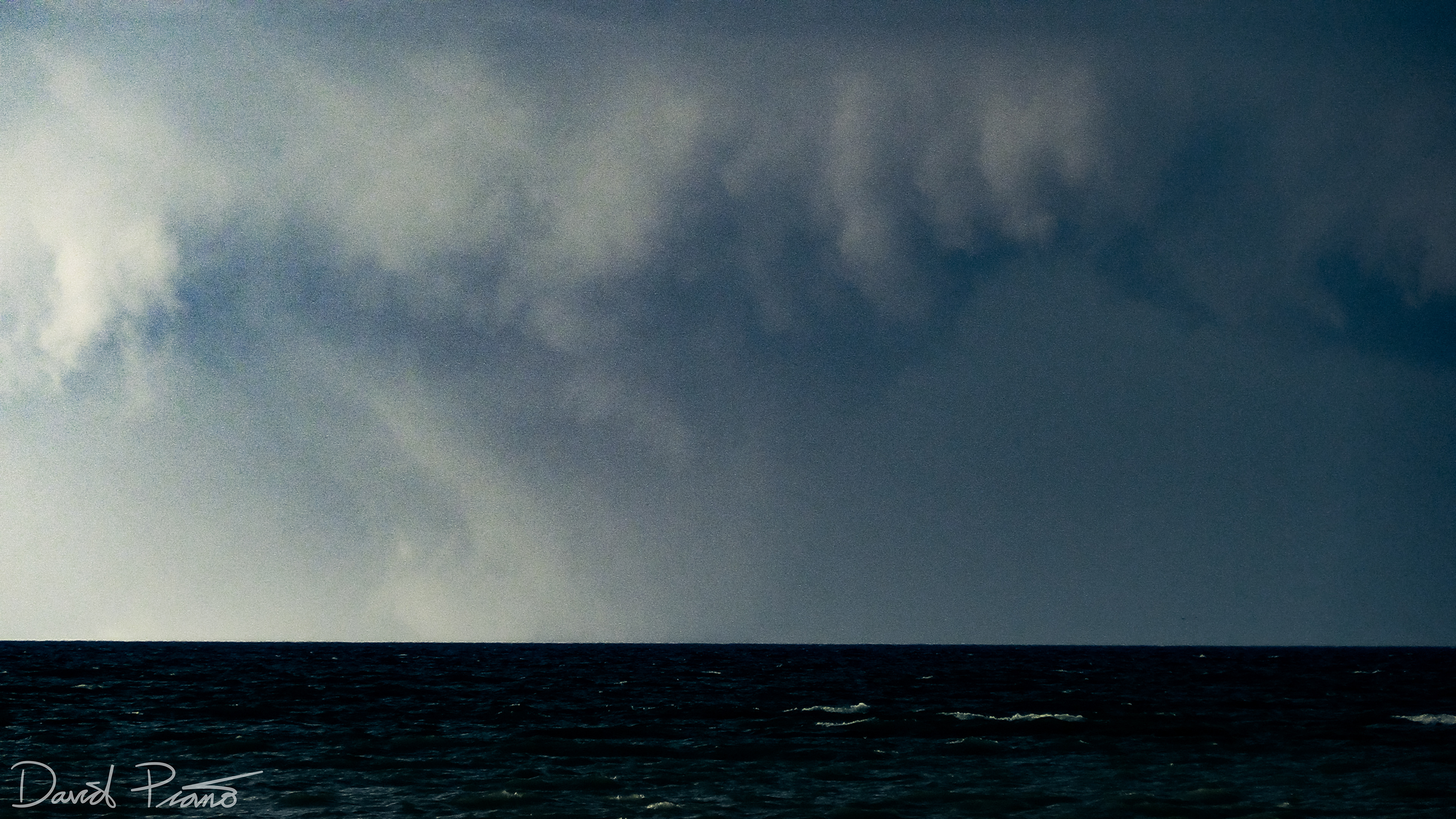 Enhanced video frame grab showing the wedge tornado over Lake Huron about to come onshore