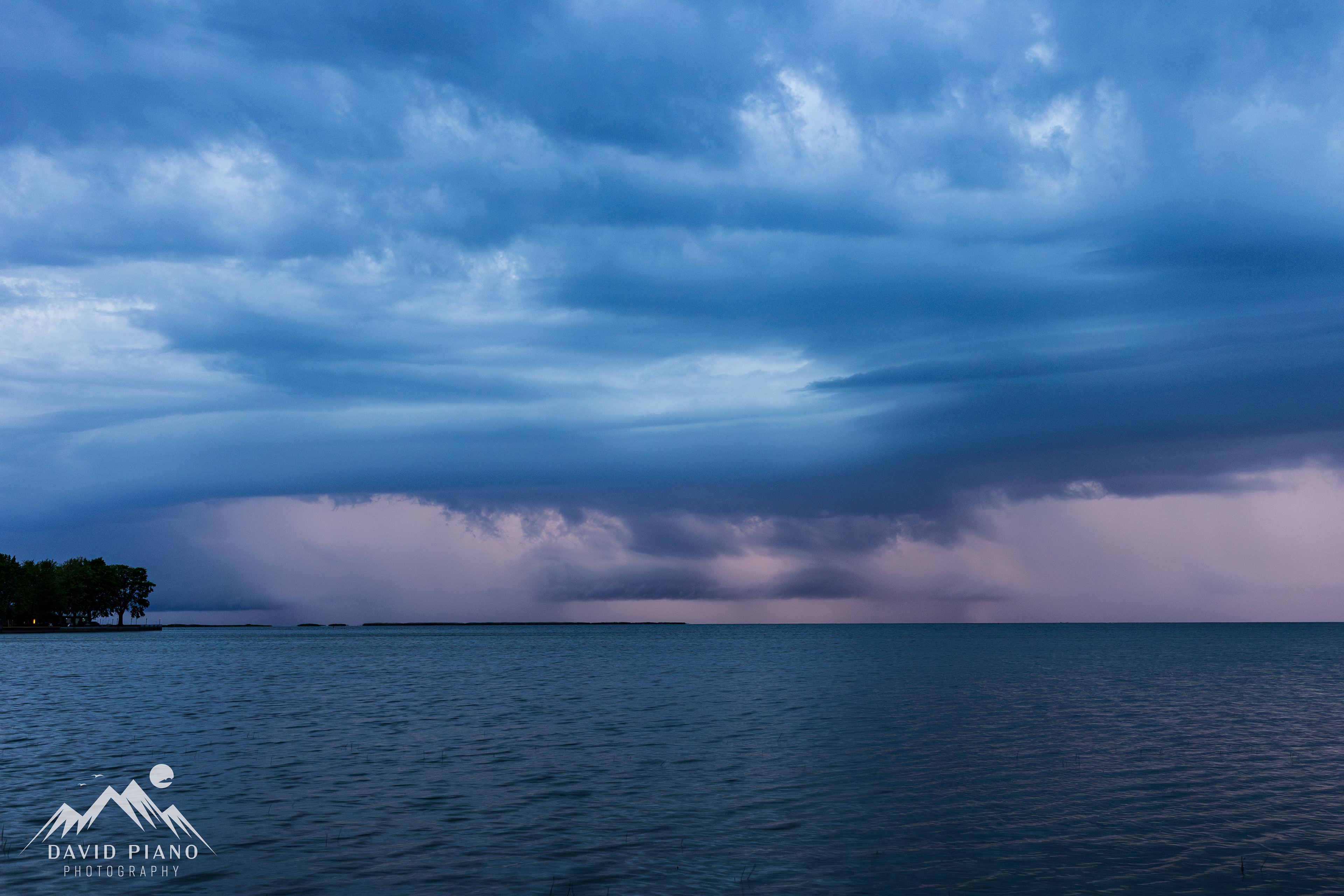A squall line approaches Mitchell's Bay during the late evening of June 18