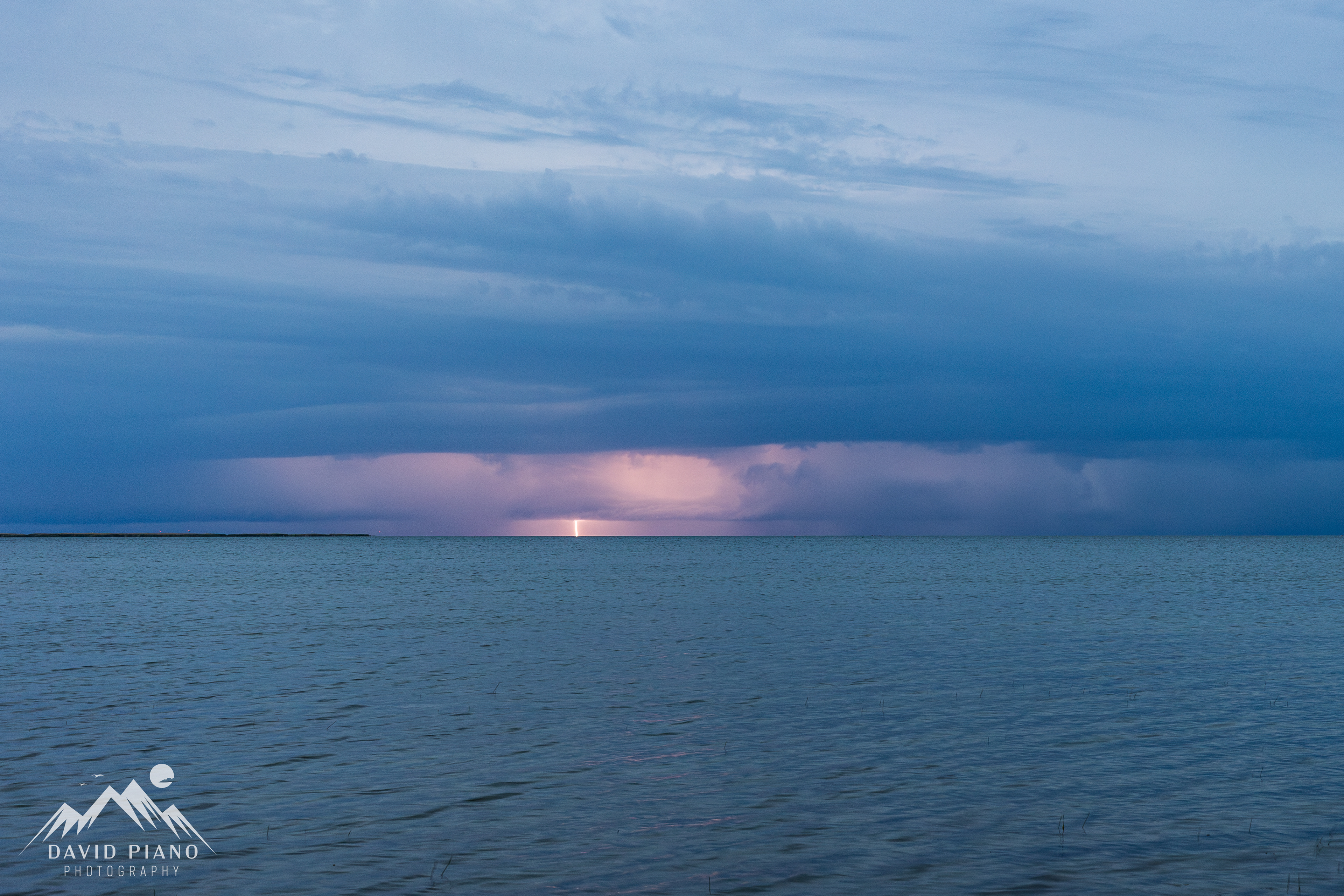 A squall line approaches Mitchell's Bay during the late evening of June 18