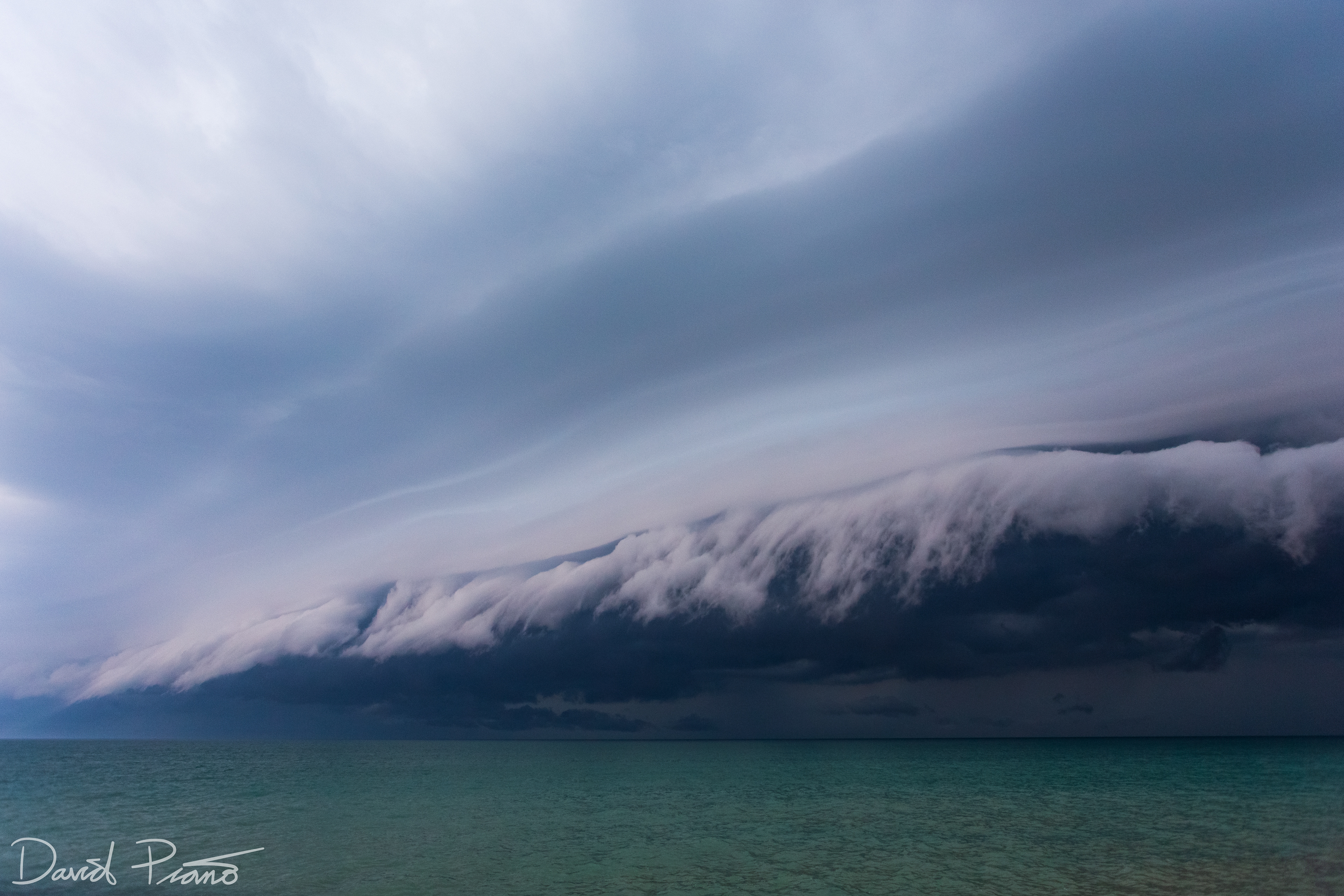 Beautiful sculpted shelf cloud rolling into Point Clark off Lake Huron -