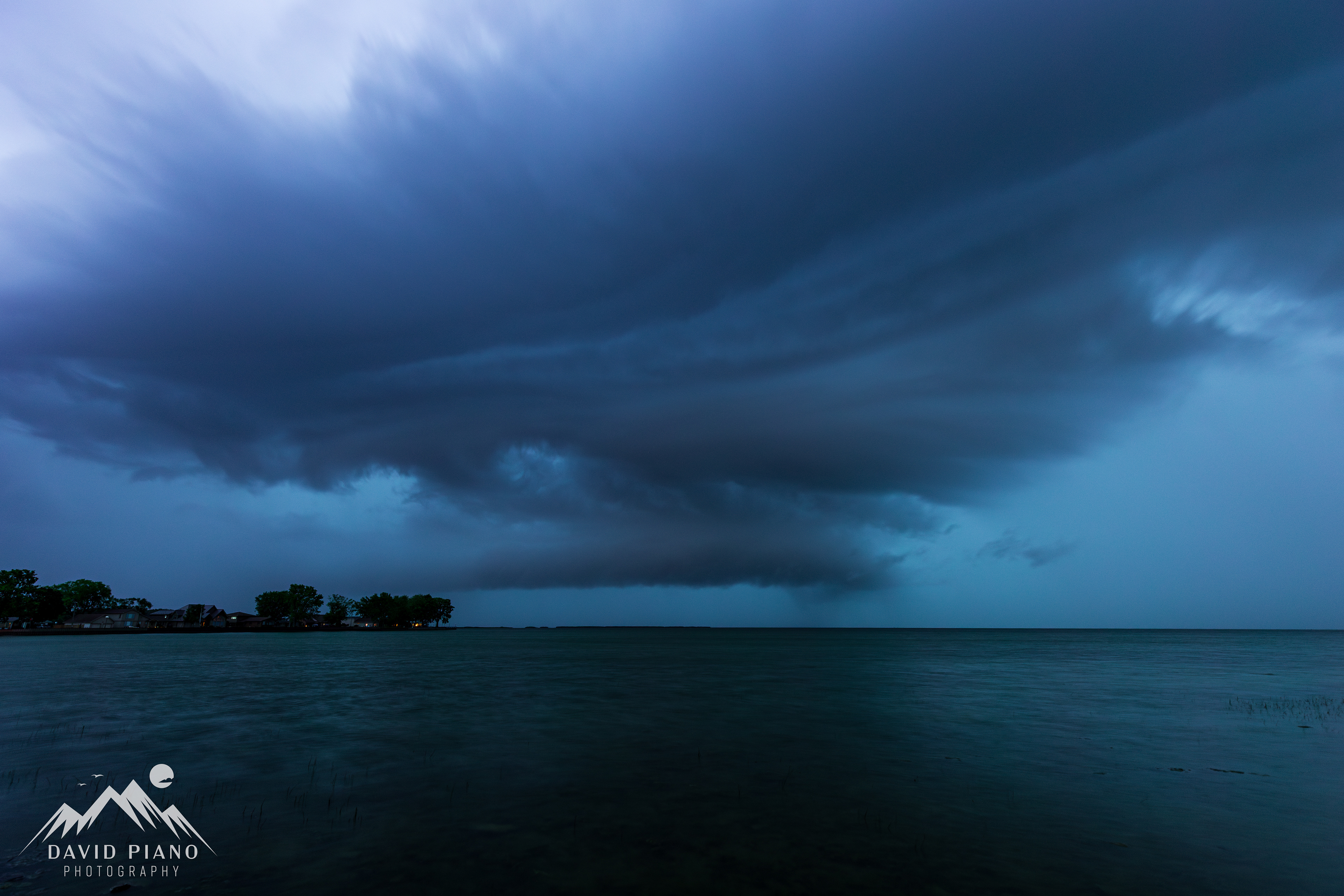 A squall line approaches Mitchell's Bay during the late evening of June 18