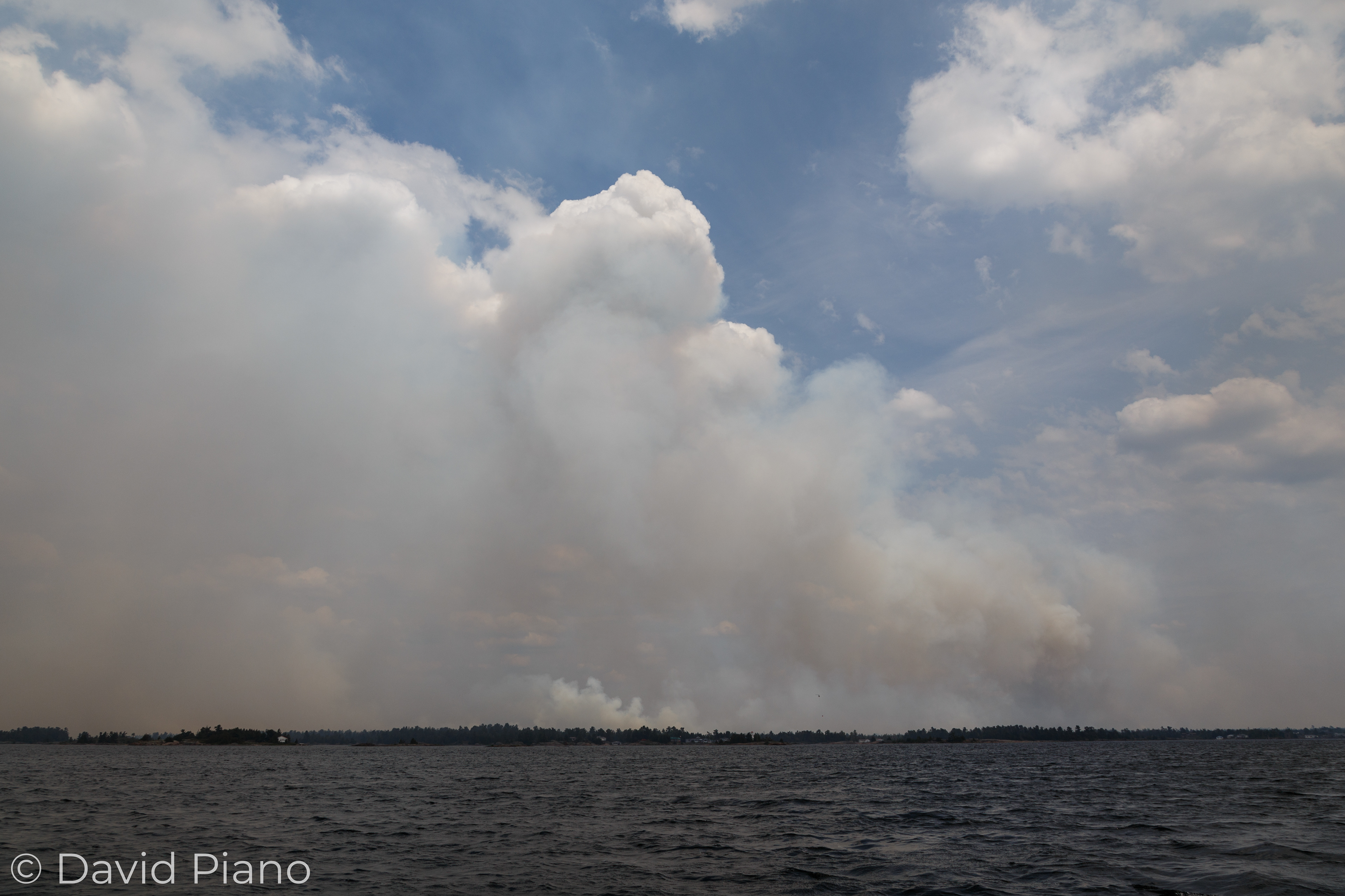Pyrocumulus is generated by the intense thermals over the wildfire - Parry Sound 33 Forest Fire - 07/21/2018