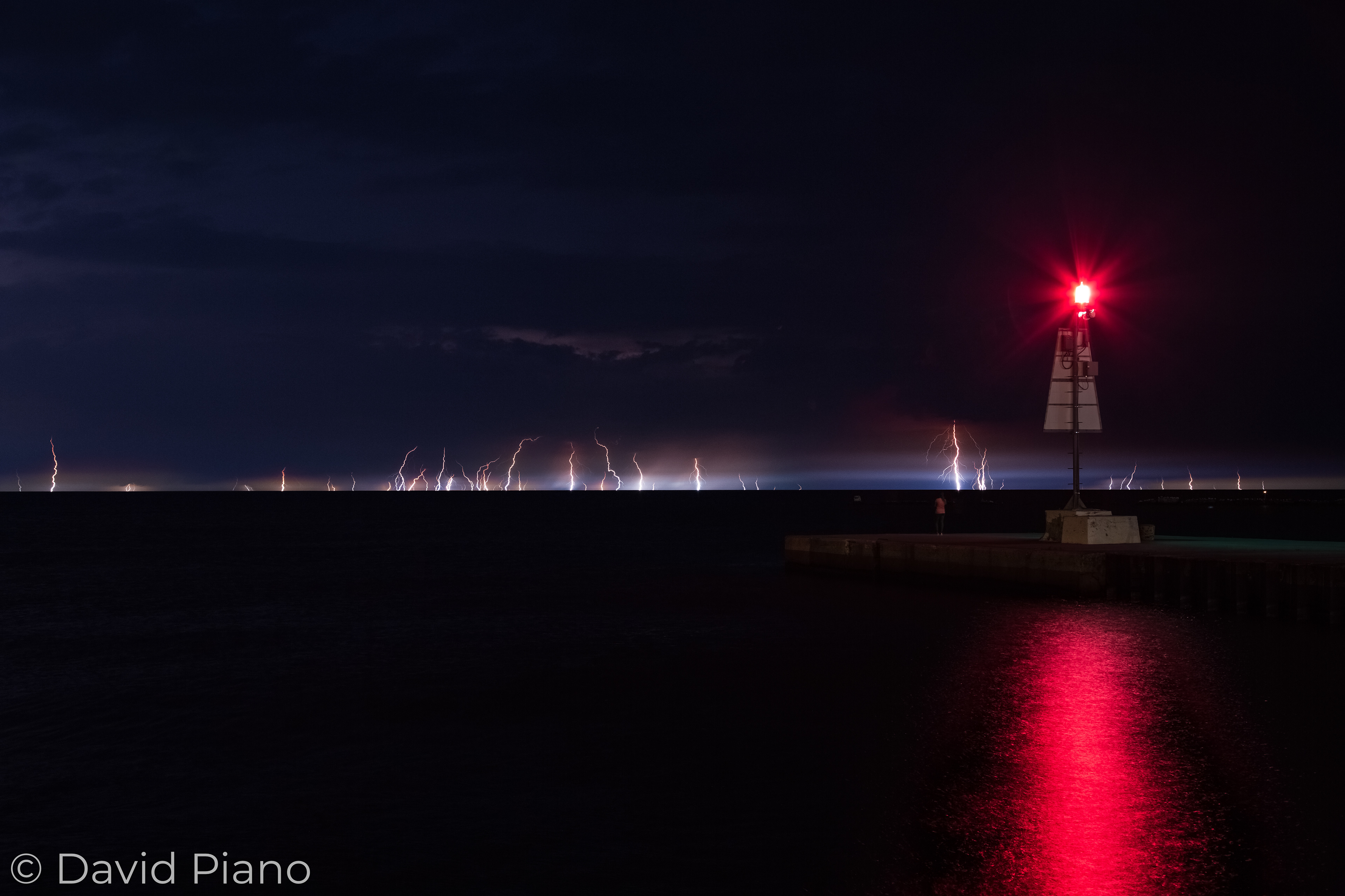 Over 50 distant CG strikes can be seen in this image from Kincardine, ON - 08/