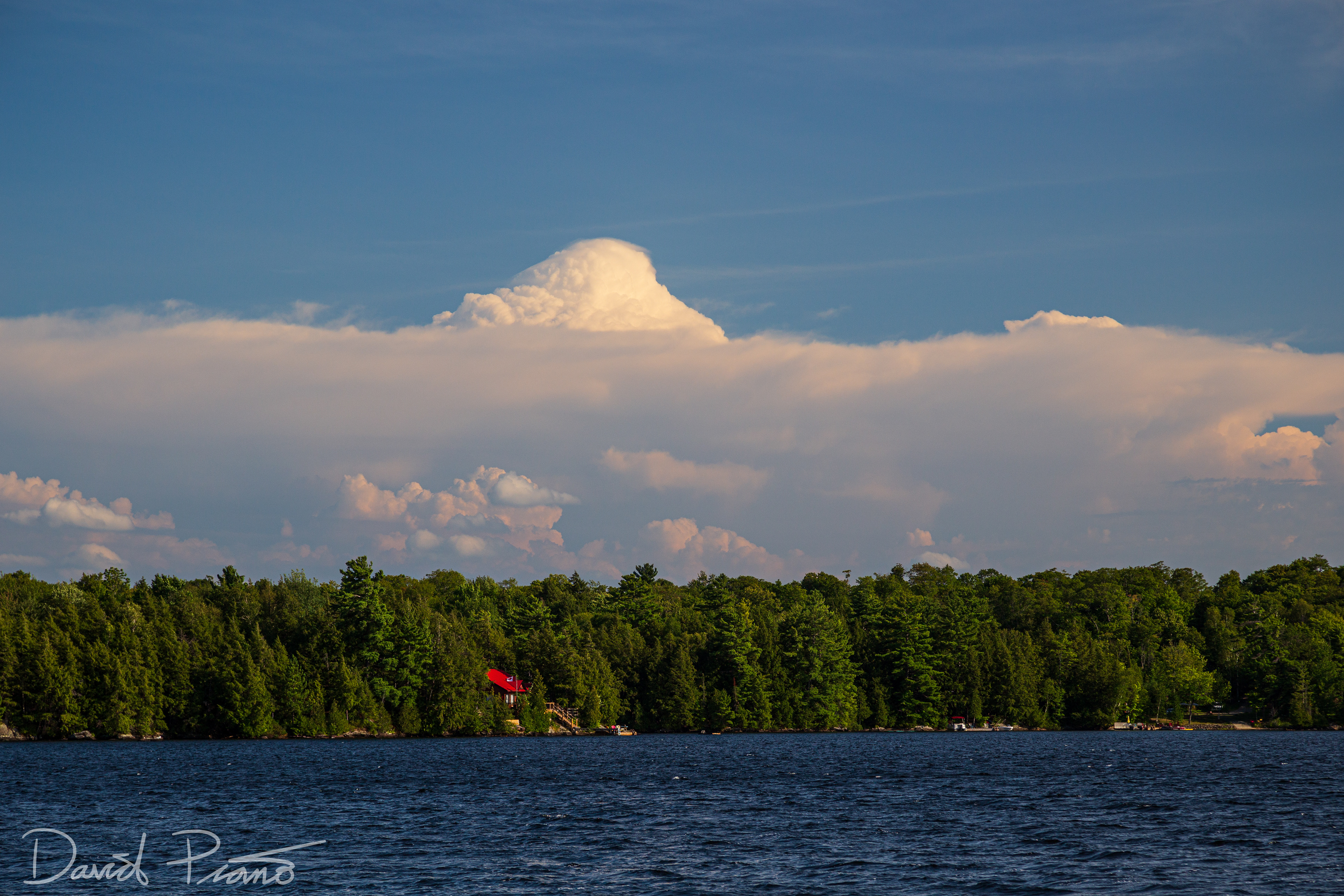 Overshooting top on a thunderstorm near Orillia seen from Lorimer Lake in Parry Sound District, ON - 08/20/2019