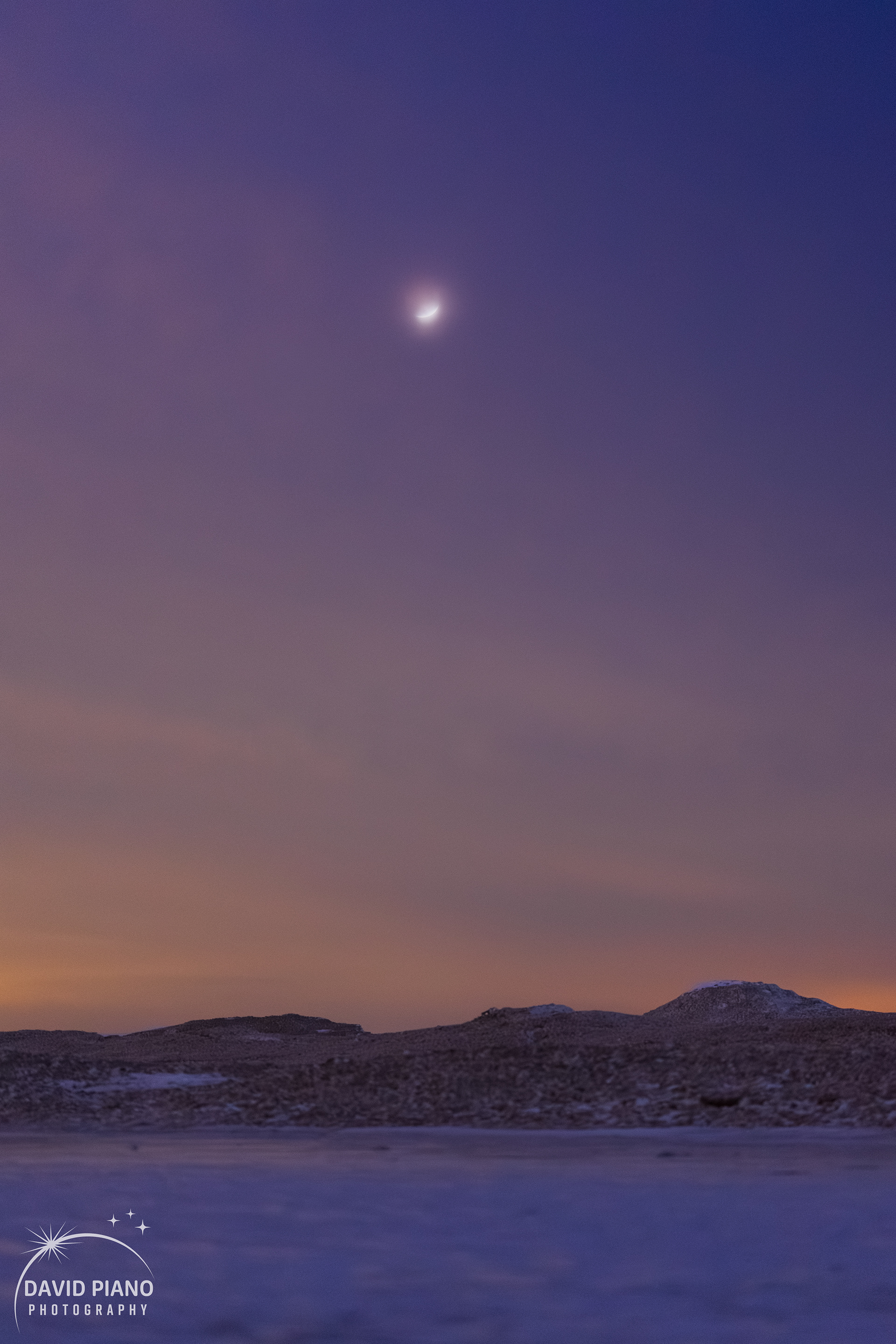 Lunar eclipse of March 3, 2026 seen through high level cirrus clouds - Pinery Provincial Park, ON