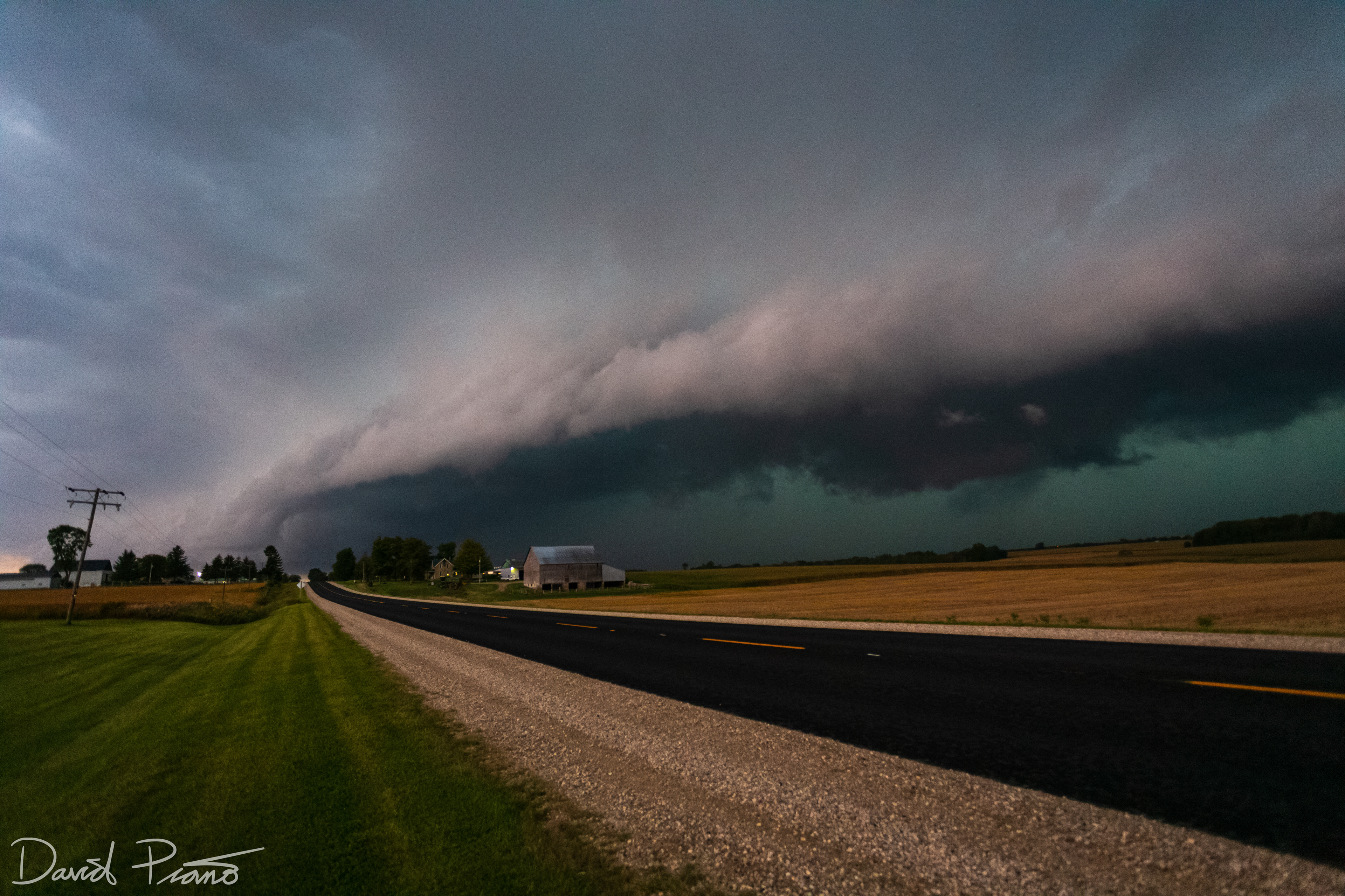 Sept. 14 - A severe thunderstorm approaches Walkerton with a mean-looking shelf cloud and a green hue.