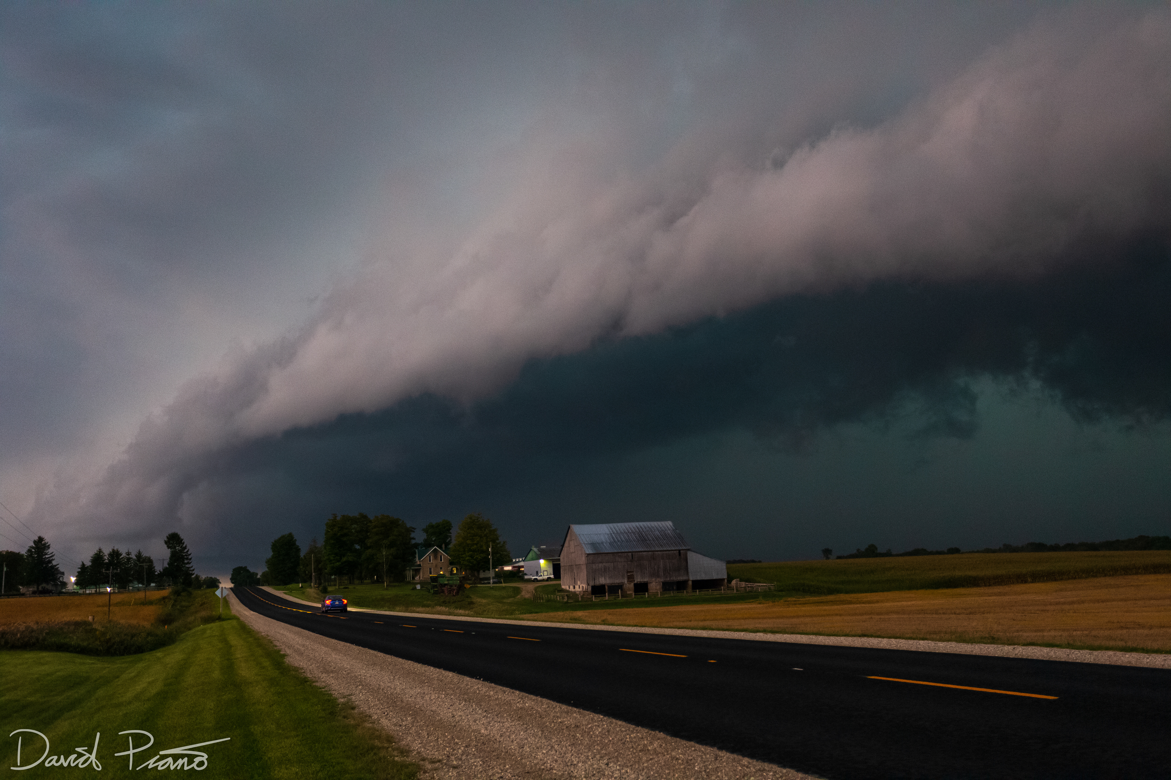 Sept. 14 - A severe thunderstorm approaches Walkerton with a mean-looking shelf cloud and a green hue.