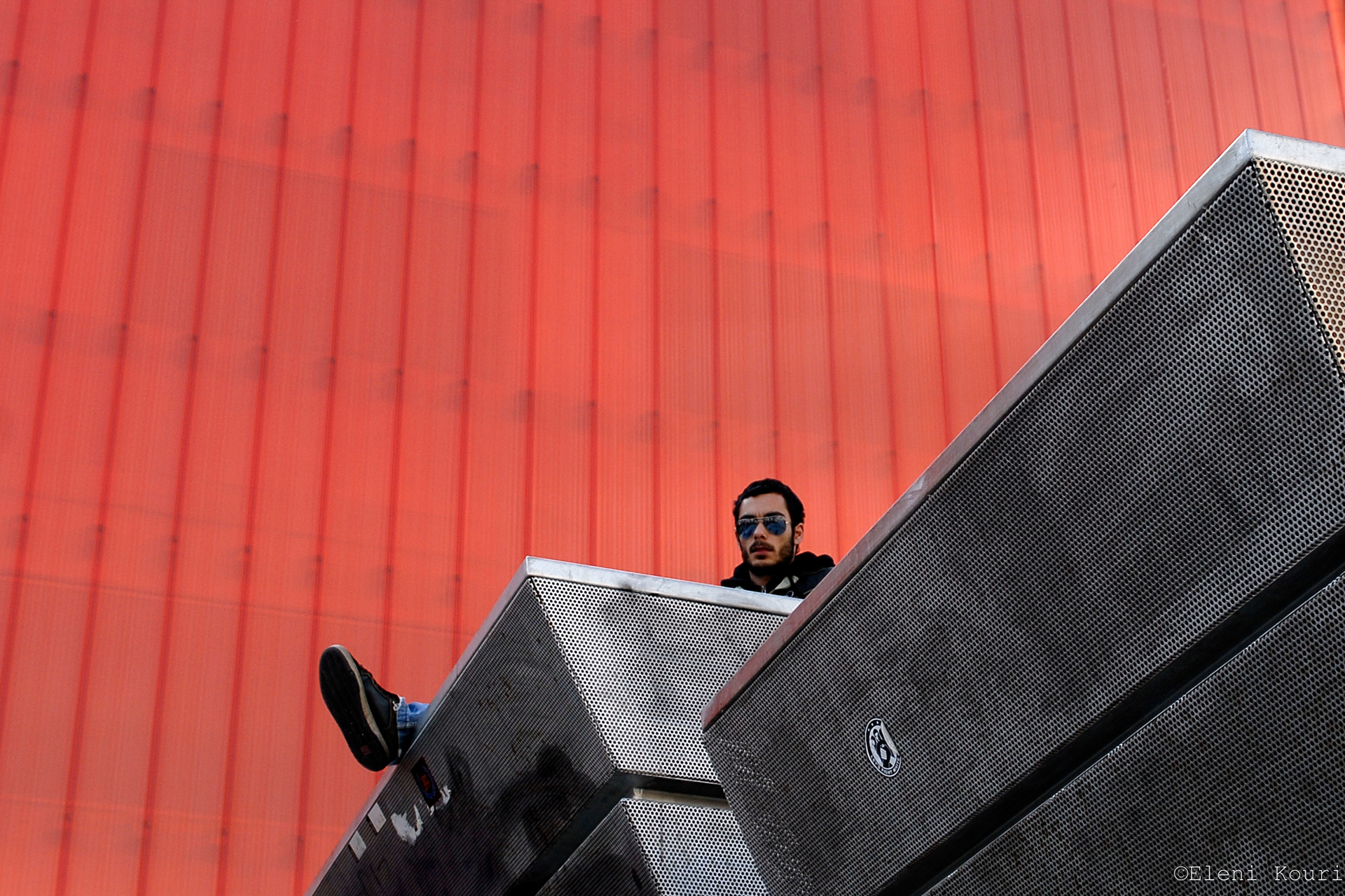 A man sitting in Monastiraki square in Athens