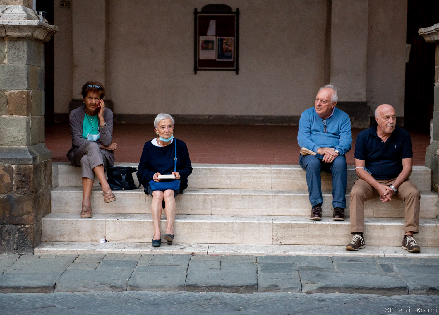 People of Montalcino sitting in the "Loggia" of the central square