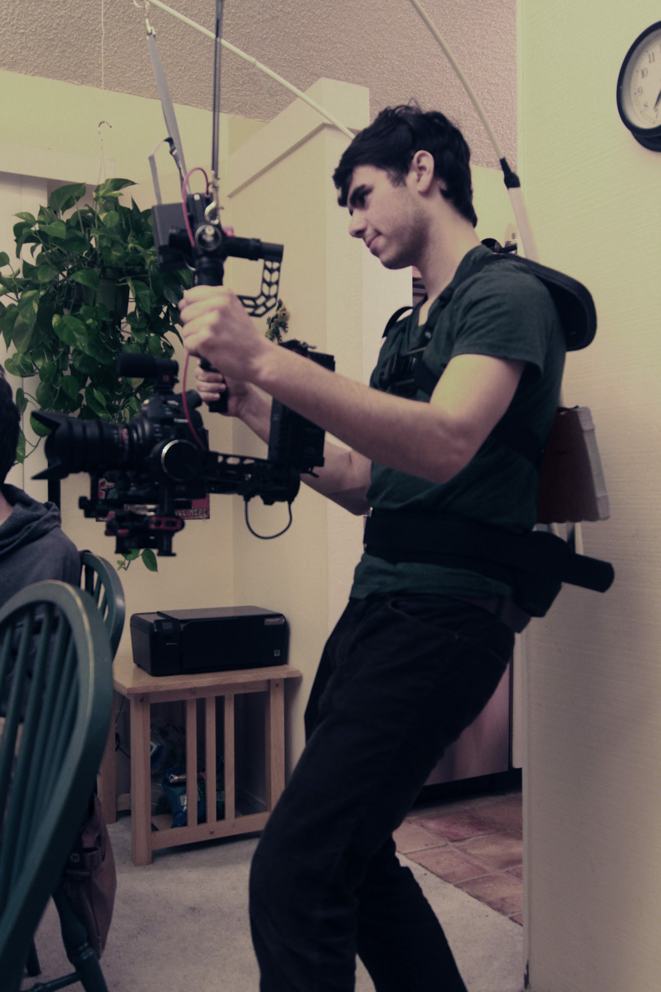 I built a harness to help my son shoot 30-minute "oner" scenes since the hand-held device was 18 lbs