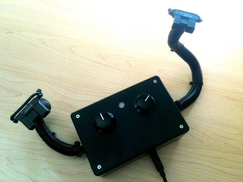 Left and right distance sensors, two rotation encoders and an RGB feedback LED using Phidgets hardware platform