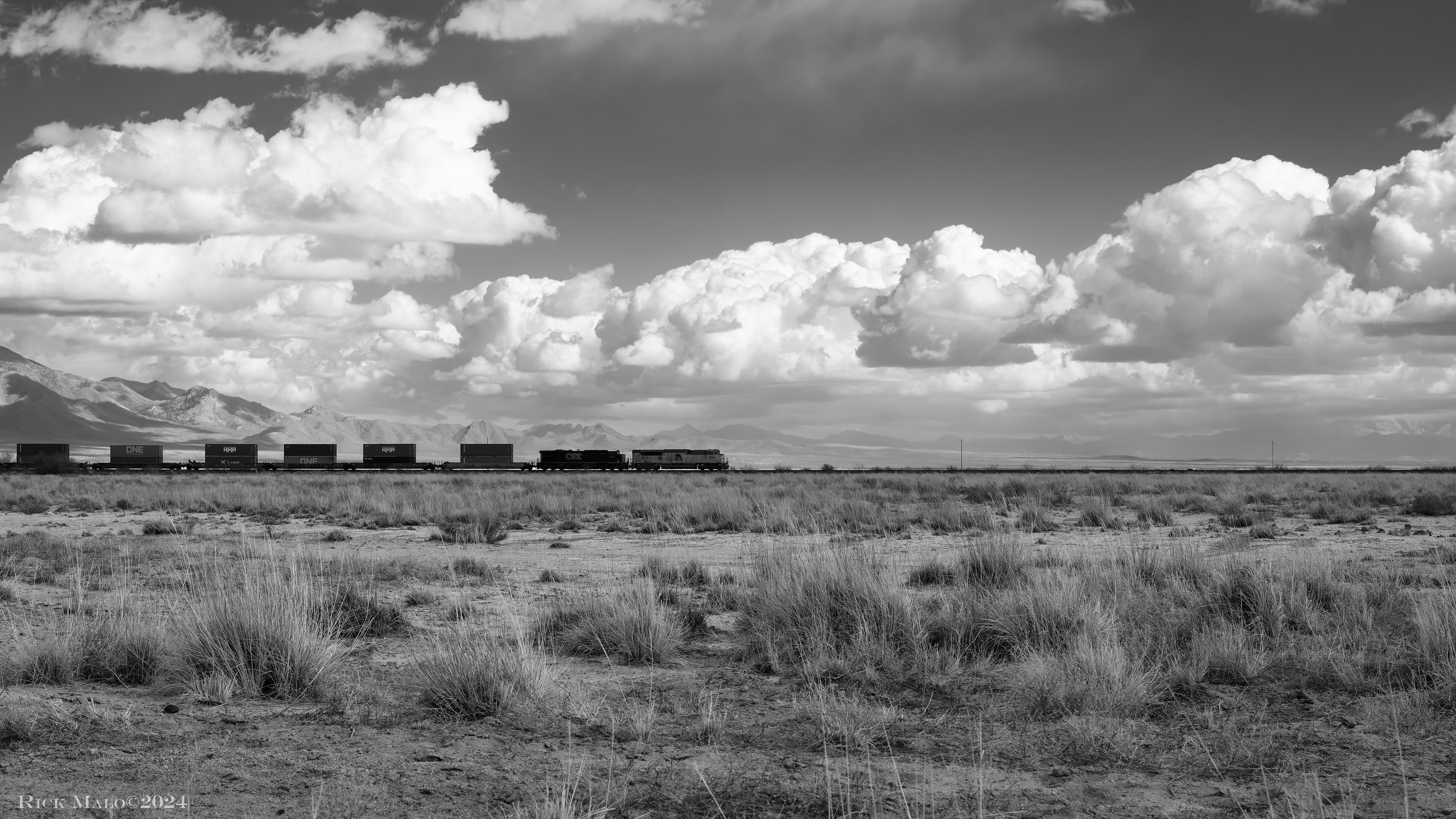 With the Chiricahua Mountains in the background, a westbound Union Pacific stack train rolls across the high desert west of Willcox, Arizona on a pleasant February 2021 afternoon.