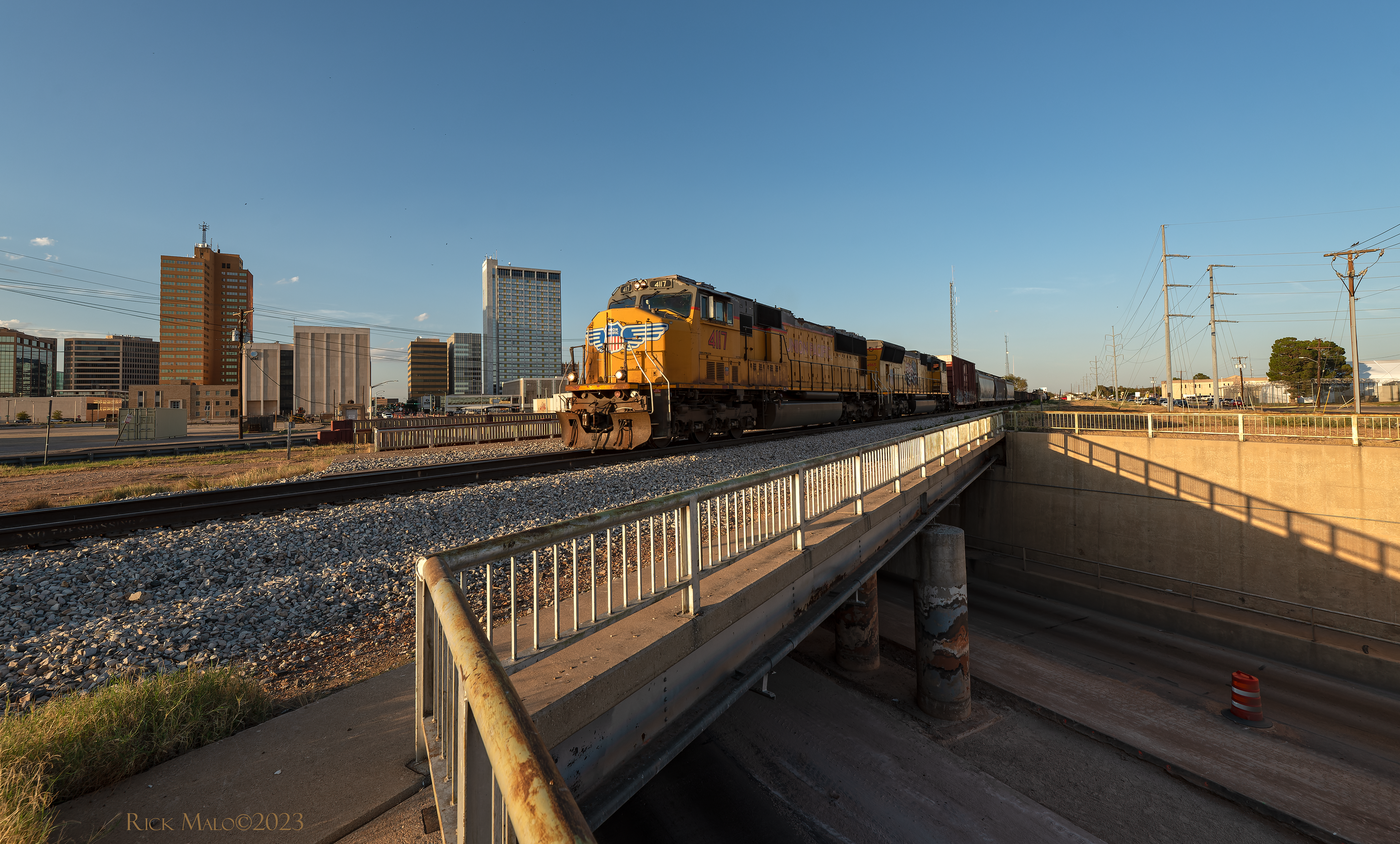 The Big Spring local rolls west over Big Spring Street in Midland, Texas on a September 2023 evening.