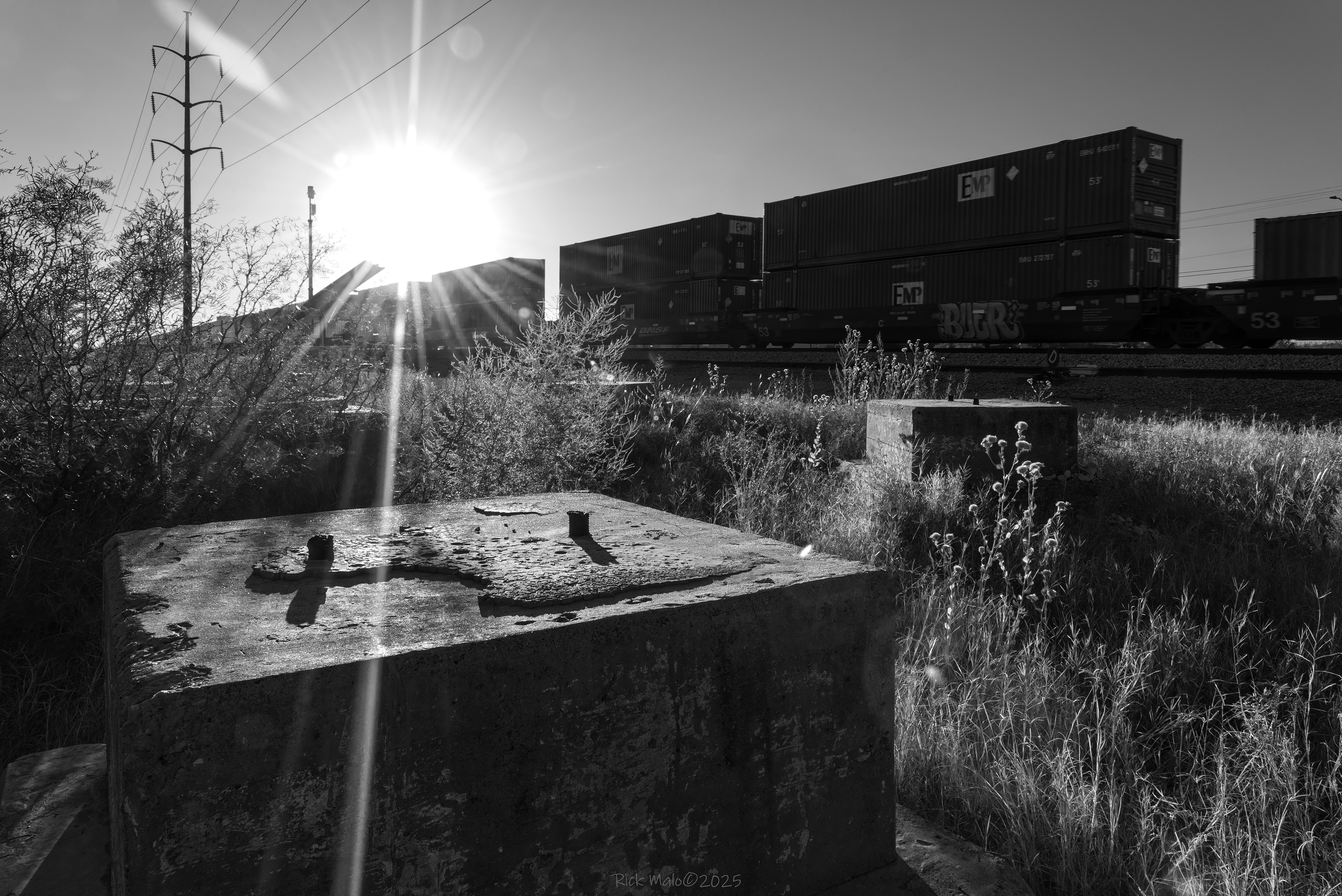 The concrete footings of the old Texas & Pacific water tower still populate the weeds on the east end of Midland, Texas.