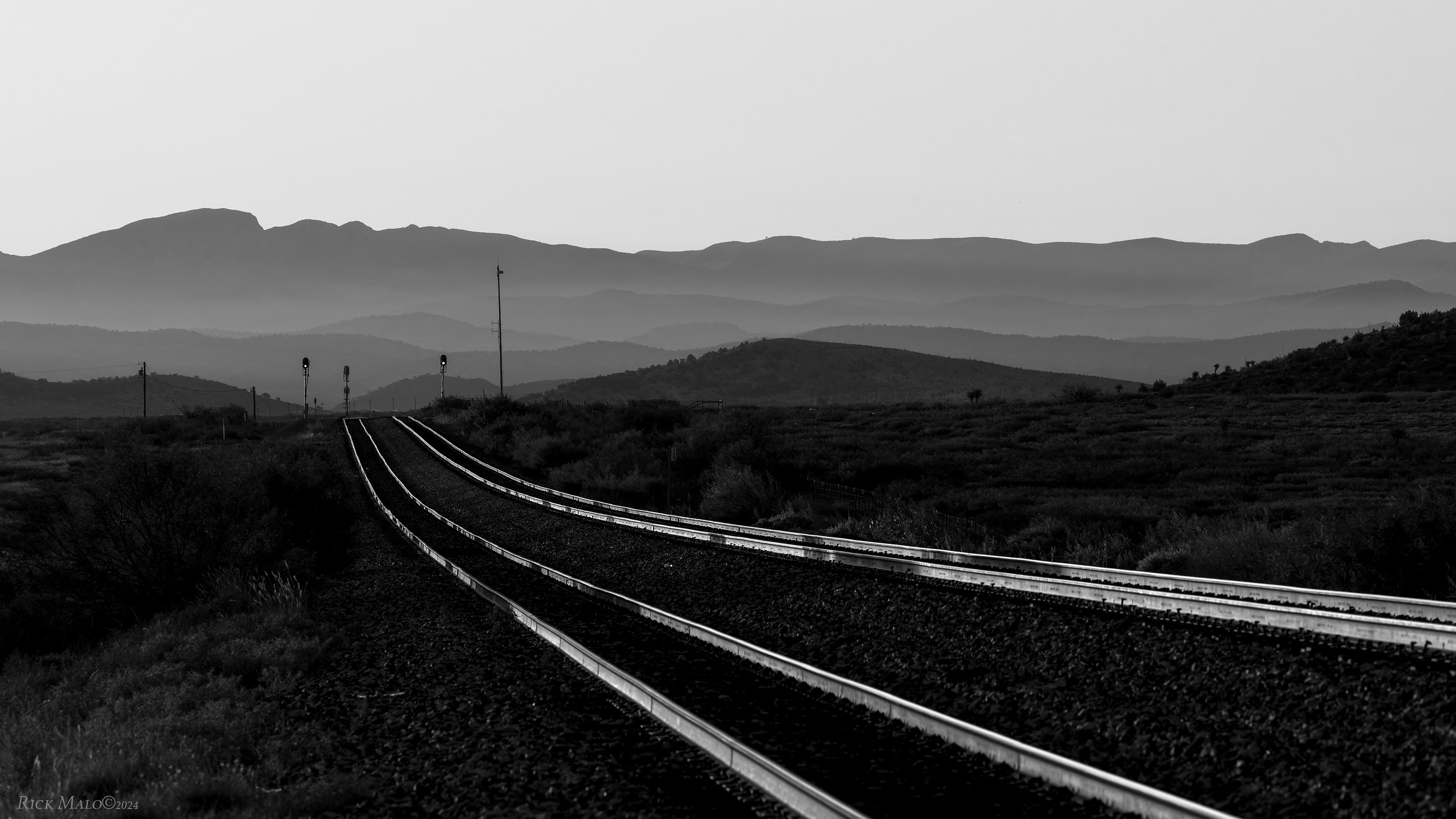 An early morning haze settles over the Glass Mountains of West Texas. The Sunset Route is quiet