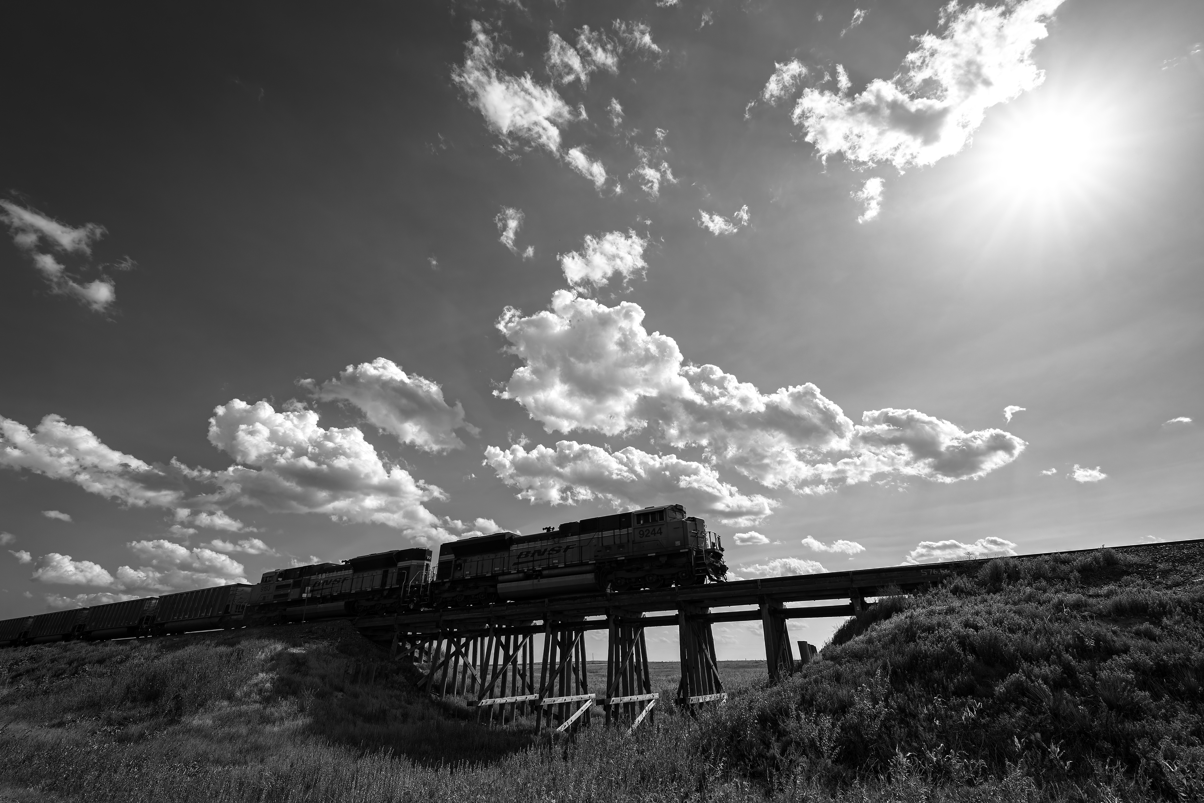 A northbound empty coal train rolls over the old wooden trestle near Canyon, Texas on the Plainview Sub.