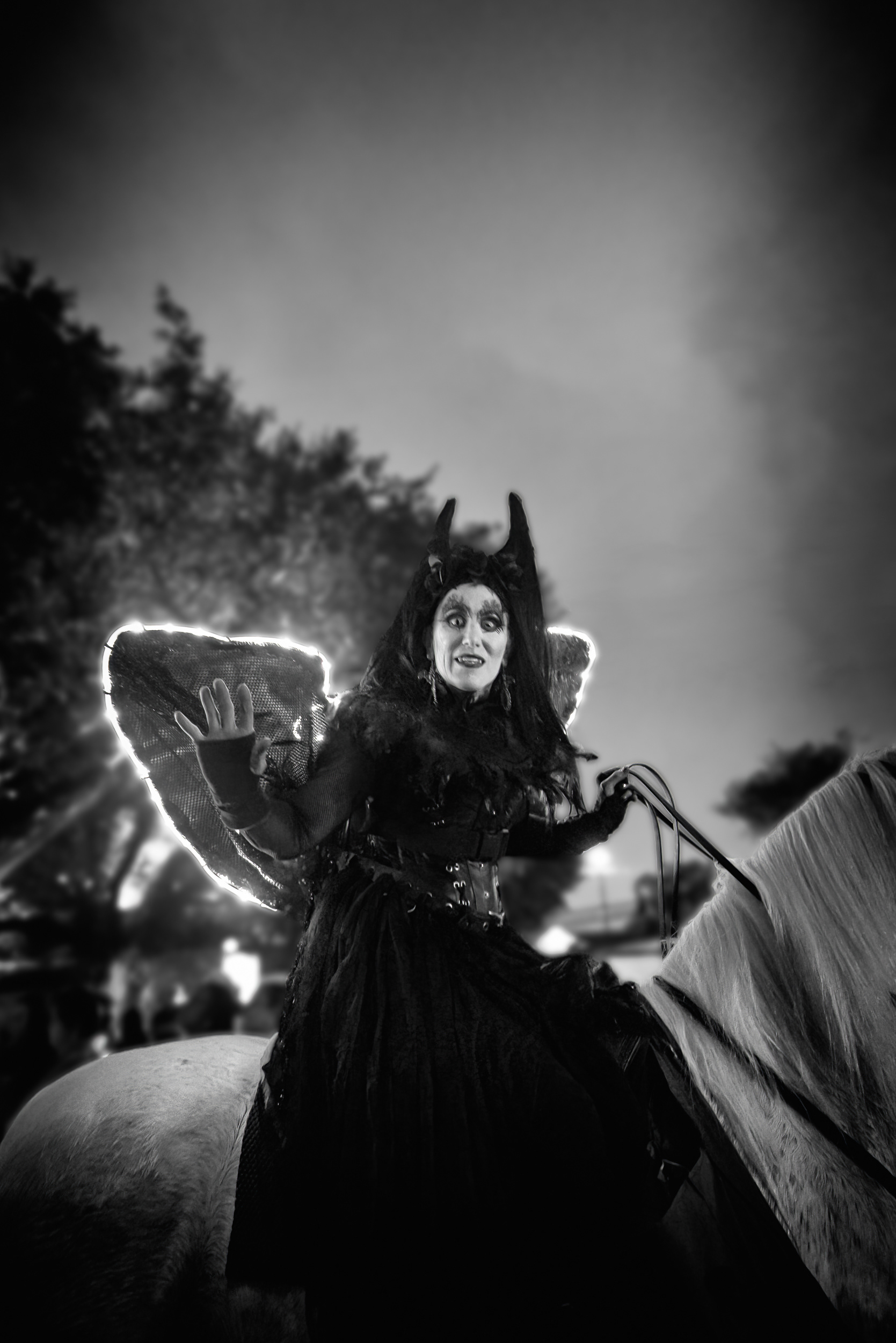 Somebody's excellent Maleficent, on an actual horse, riding in the Krewe of Boo — New Orleans's official Halloween parade, founded only in 2008, a relative infant by local krewe standards. I don't know her role in the krewe, but mounted riders have been part of New Orleans parades for a long time, this one included.