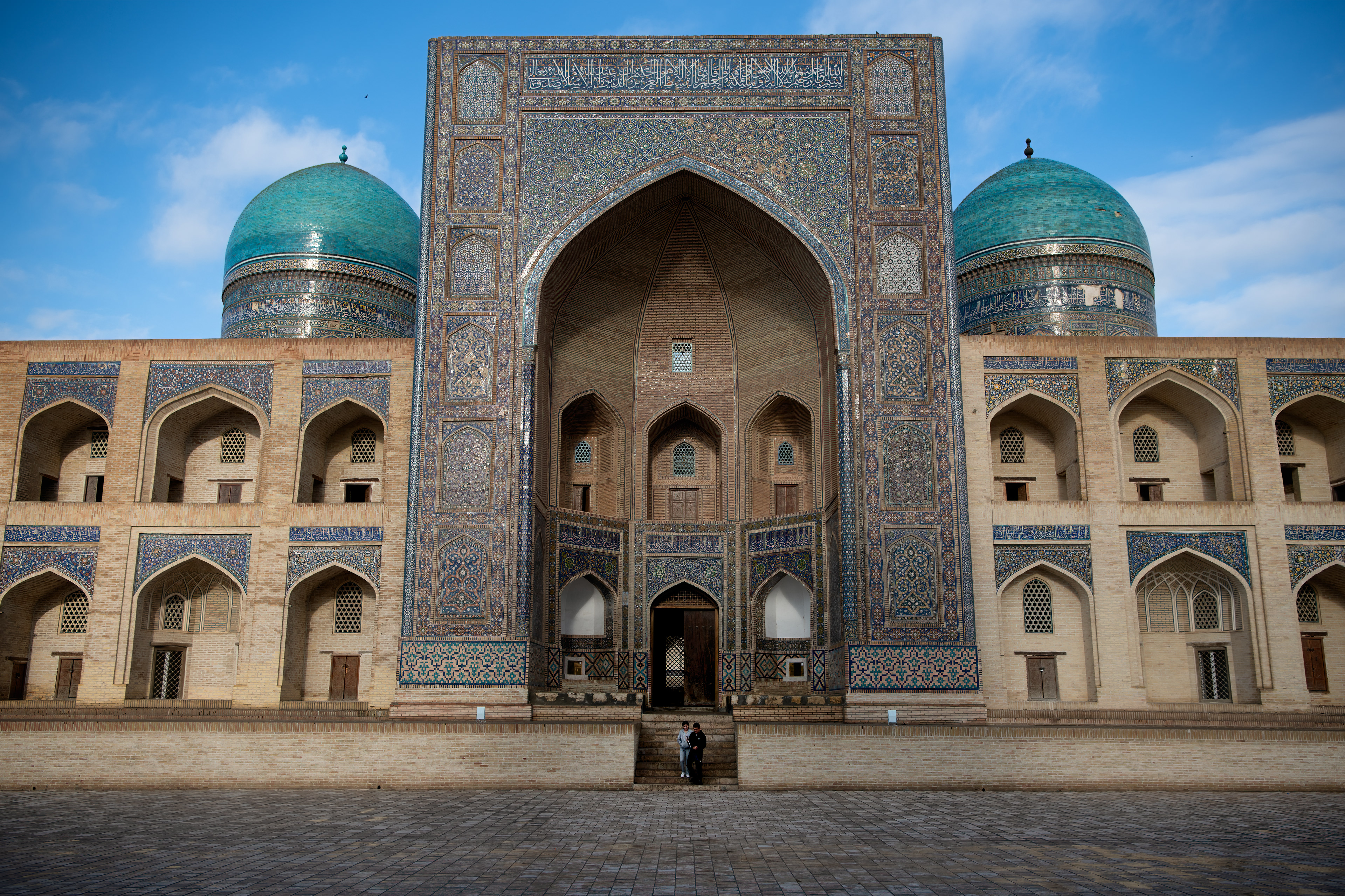 Built in 1535, funded (the story goes) by selling three thousand Persian captives, the Mir-i-Arab has never stopped being a madrasah — through khanates, through the Soviets, who let exactly three religious schools in Central Asia keep operating and made this one of them.