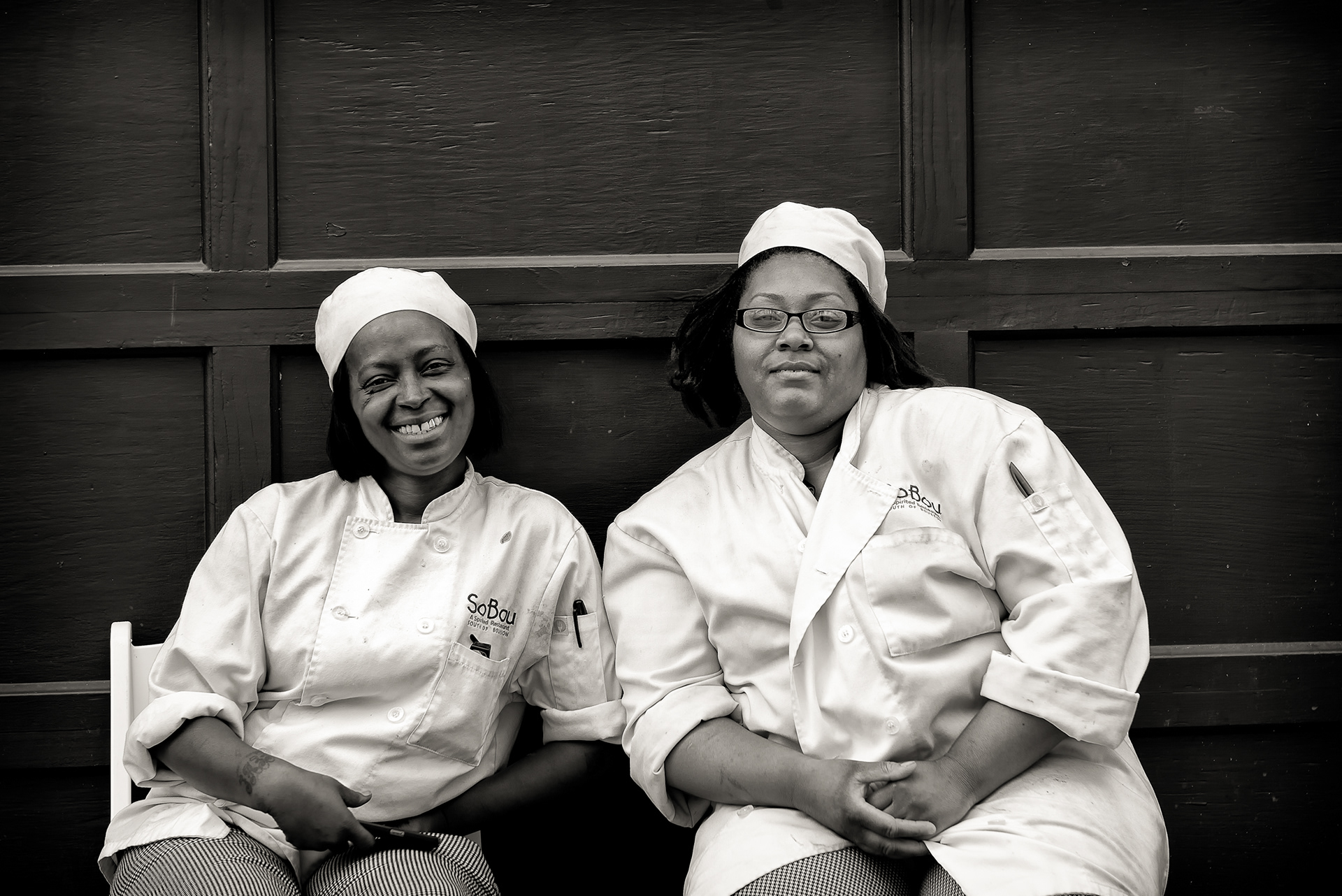 These two worked at SoBou, the Commander's Palace family's cocktail-and-Creole spot inside the W Hotel on Chartres Street — the name is just a location, South of Bourbon, though it always sounded like it should mean something grander. It opened in 2012 with the kind of pedigree New Orleans restaurants either have or don't (the Brennans, several generations deep into running this city's dining rooms), and it's closed now, one more kitchen that outlasted the trend it opened into and then didn't outlast the next one. Whatever this shift looked like from their side of the pass, it's over.