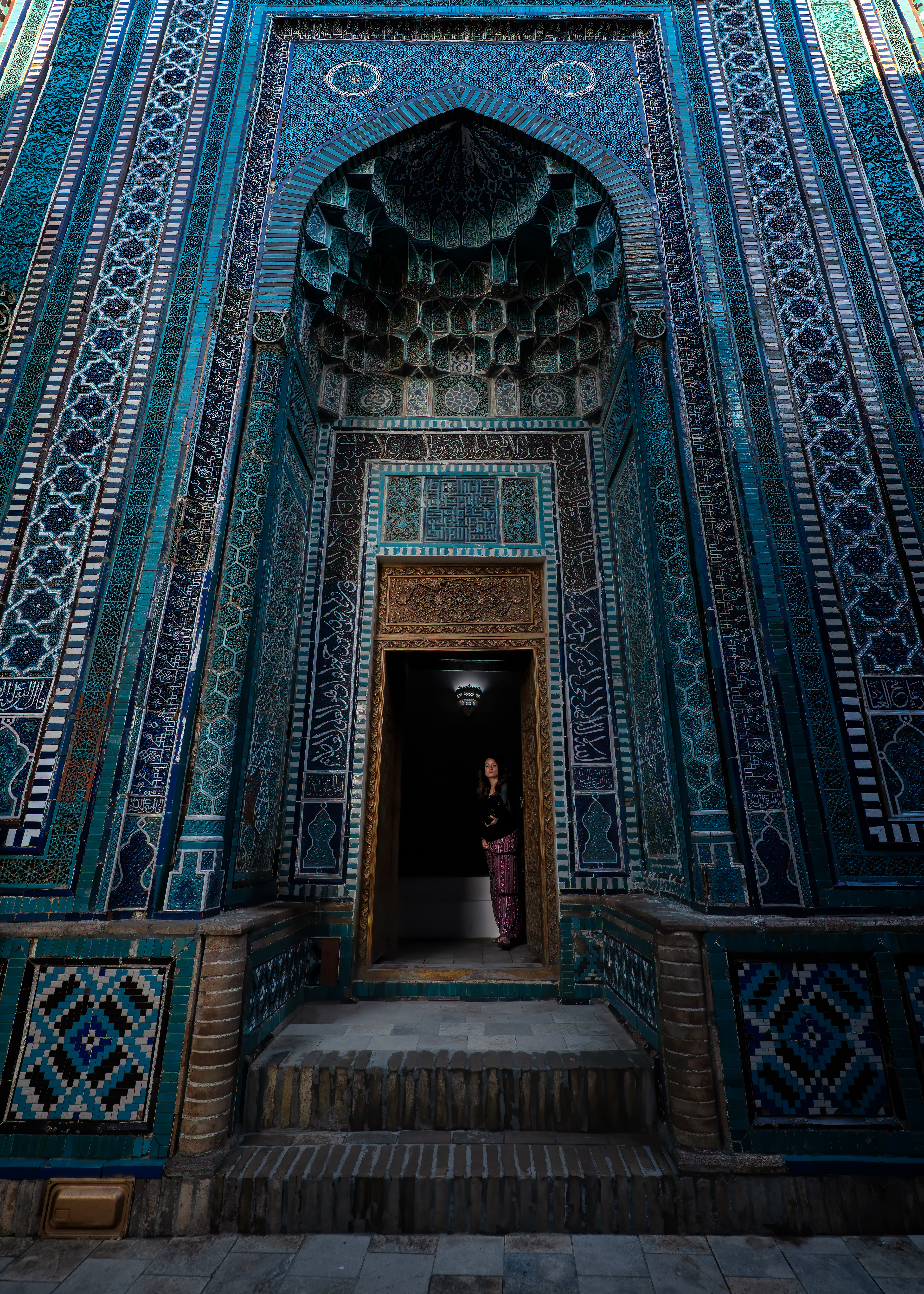 Locals will tell you a pilgrimage here counts the same as a hajj to Mecca — which is either devotional math I'm not qualified to check, or the best explanation for why this is still an active shrine and not just a tourist stop with good tile. The muqarnas work in that niche is meant to look weightless, all those honeycombed cells stacked to catch the light differently at every hour.