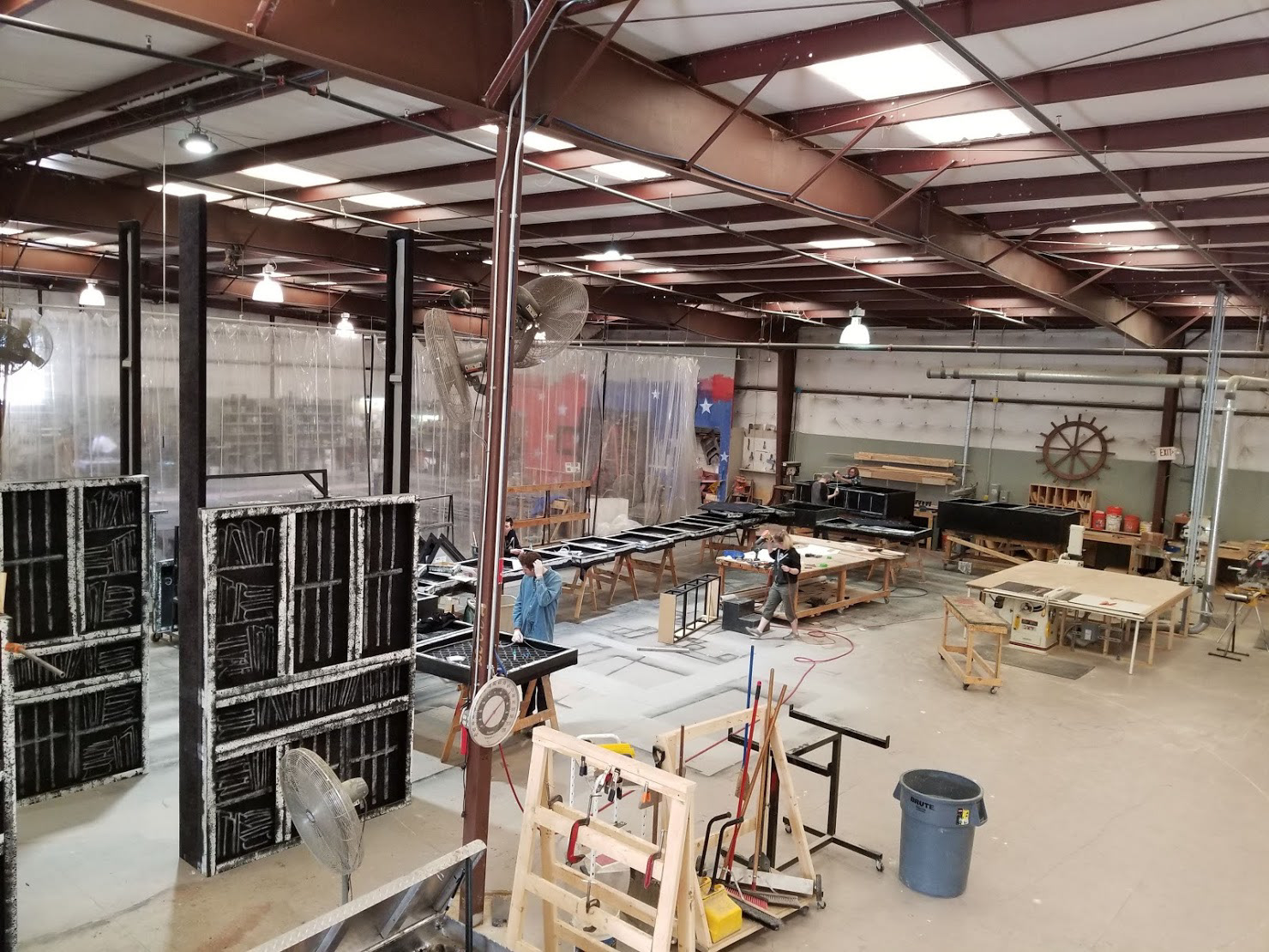 Assembling the pieces of the Scenery in the shop and installing lighting prior to Load in.