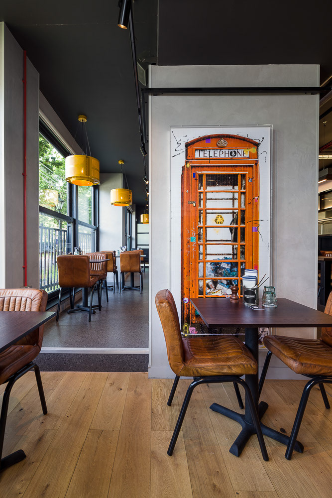 Artworks behind glass by Piers Bourke at Gordon Ramsay Restaurant, London