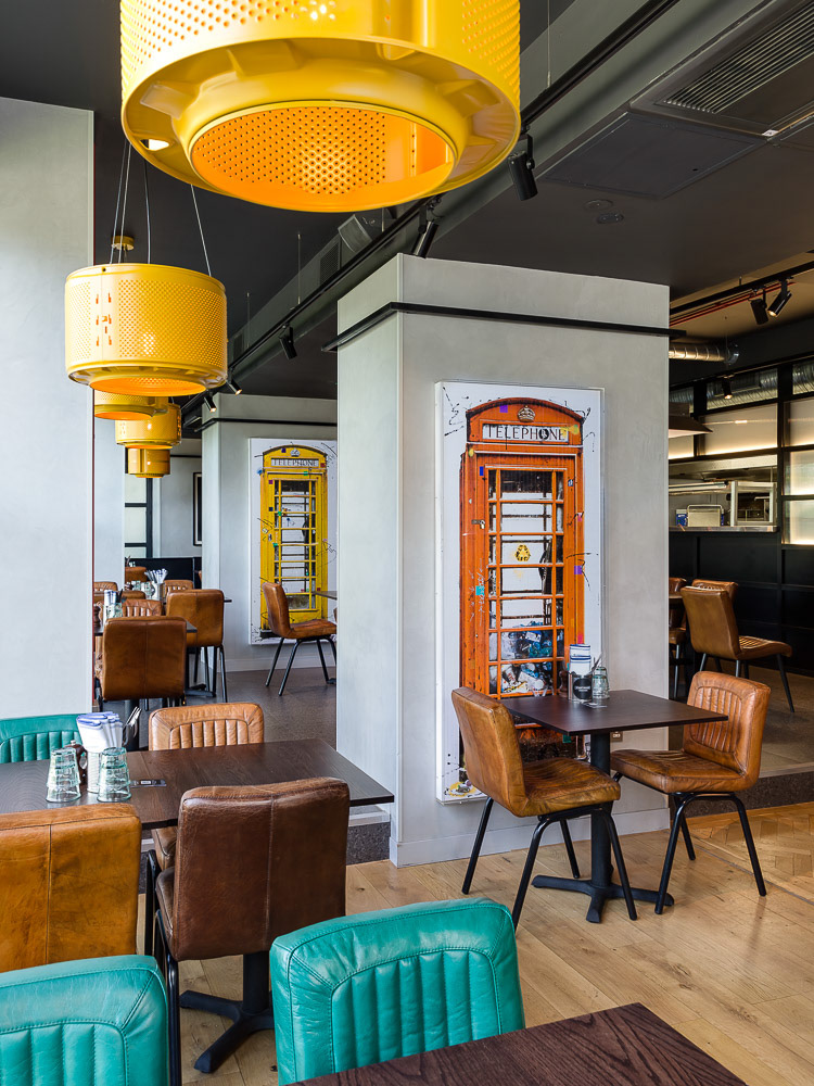 Artworks behind glass by Piers Bourke at Gordon Ramsay Restaurant, London
