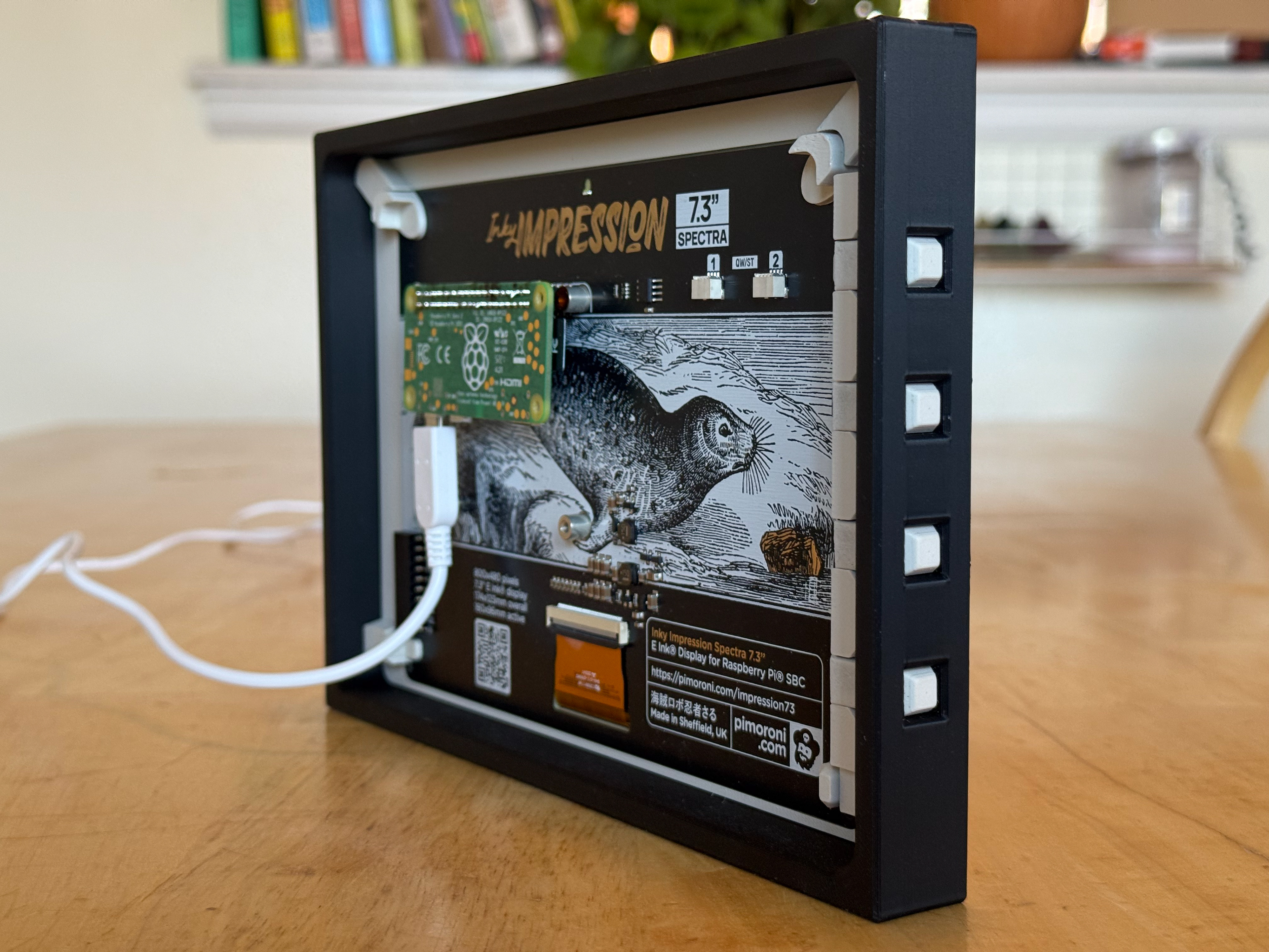 Back of device, open. The four buttons on the right allow for regeneration at different stages in the prompt chain. But the device runs normally without user intervention.