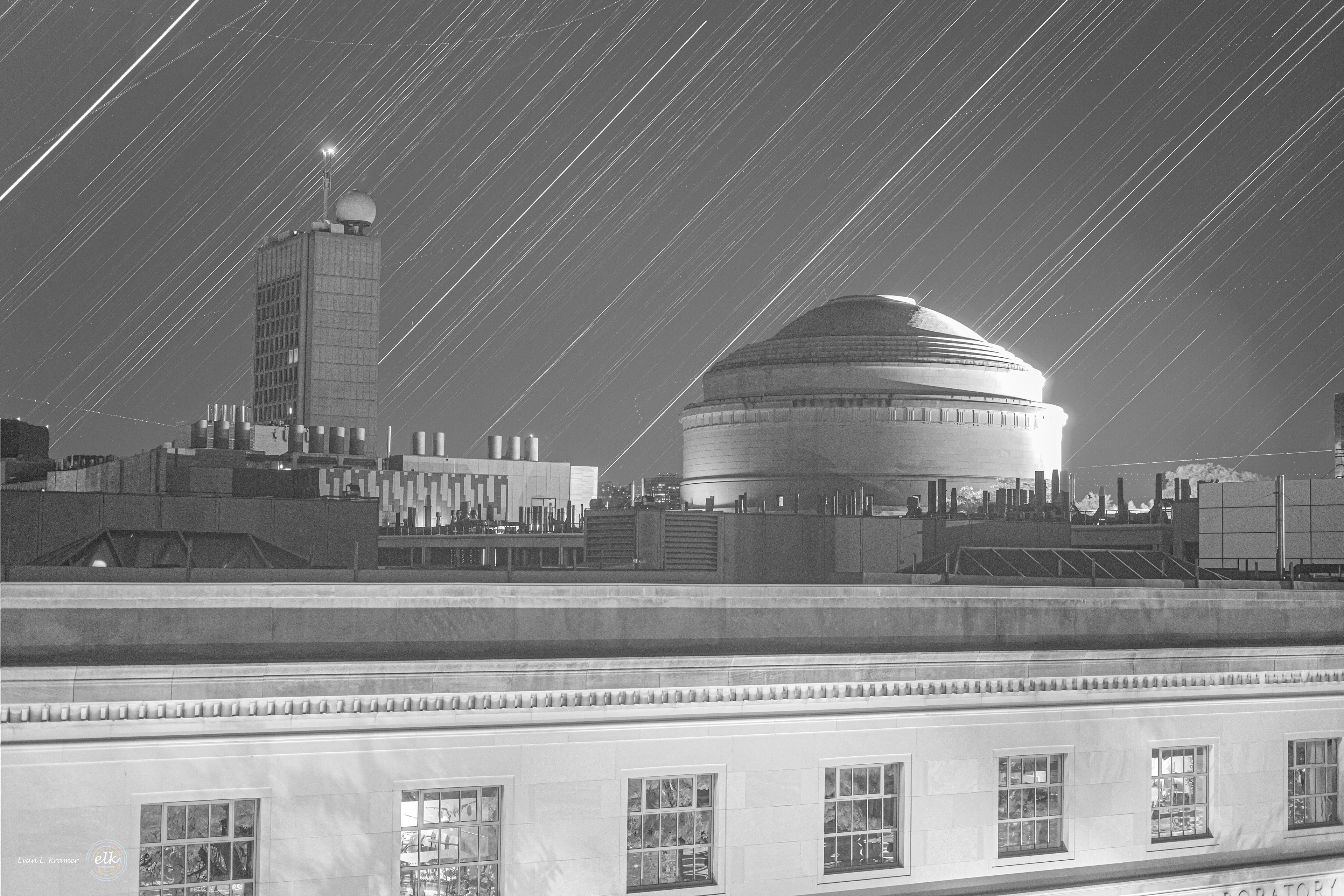 Star trails over the MIT Dome and Green Building in infrared.