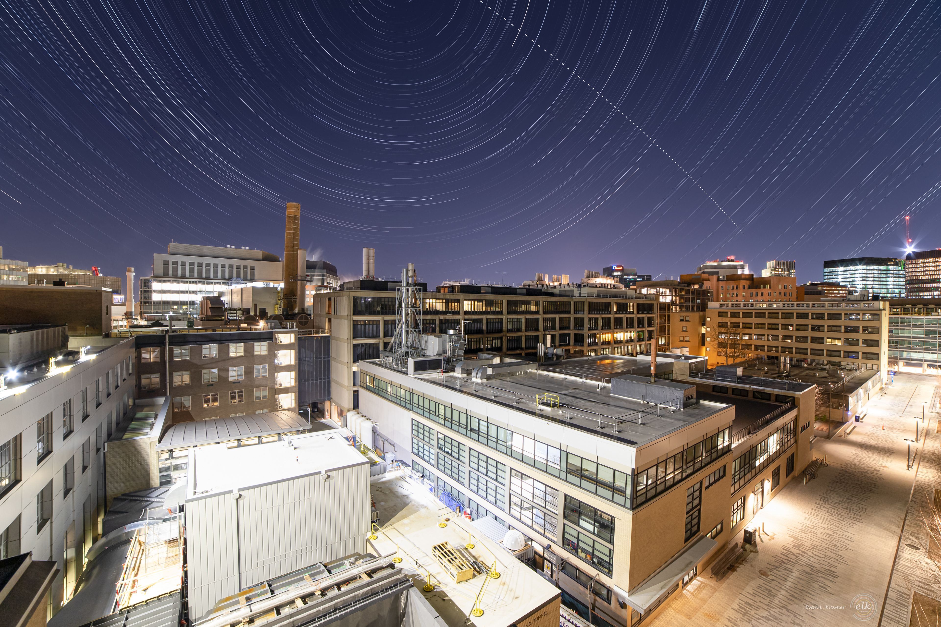The international space station and star trails over the Aeronautics and Astronautics complex. Cambridge, MA.