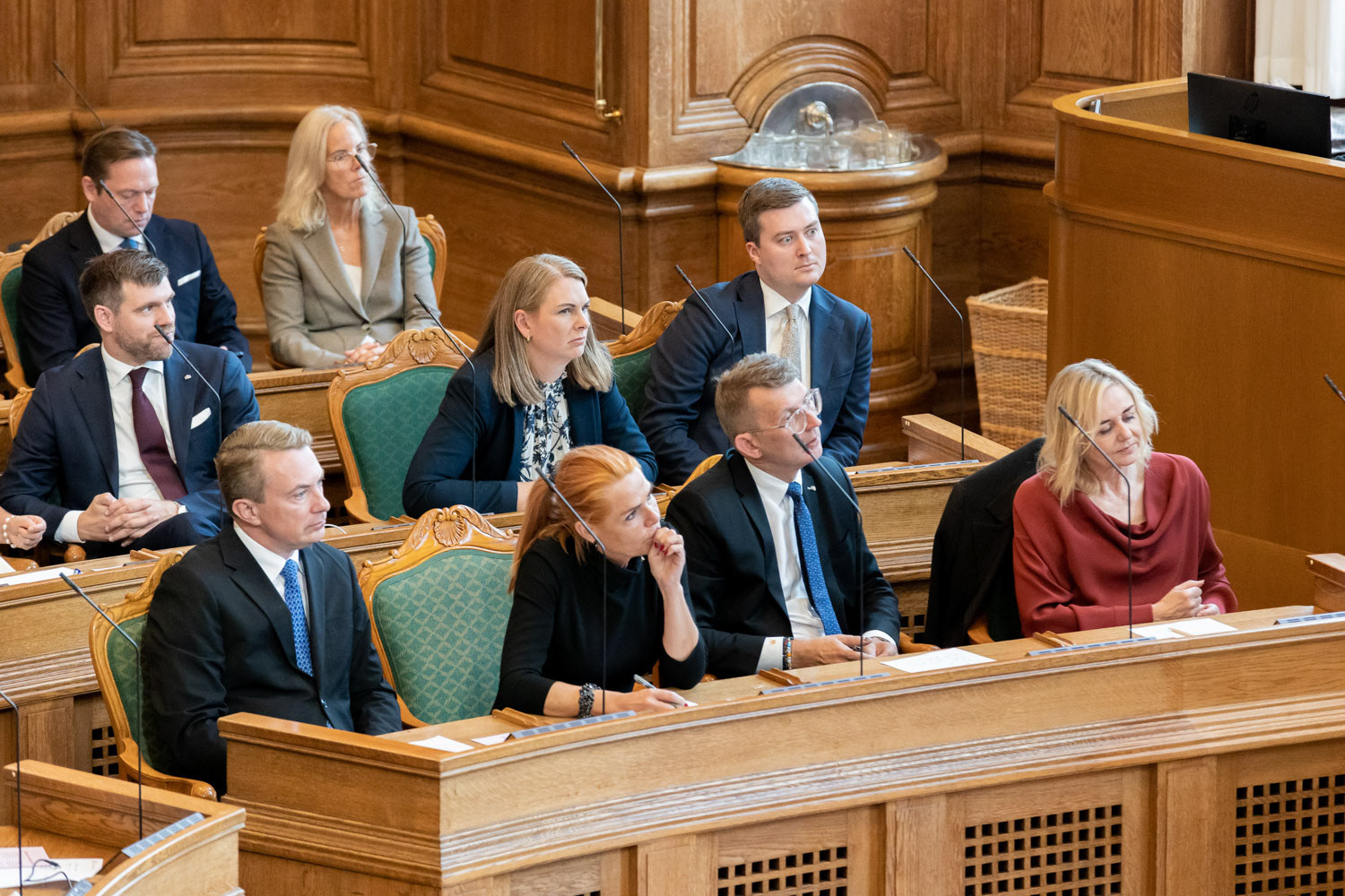 Danish party leaders watch the speech of Danish PM Mette Frederiksen on the opening day of the Danish Parliament at Christiansborg Palace, Copenhagen, October 6, 2026 / for NurPhoto Agency