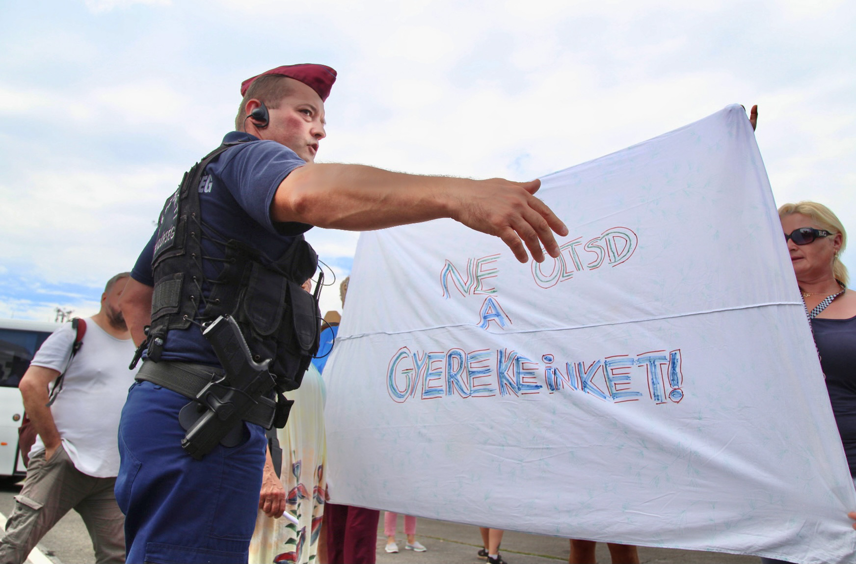 "DONT VACCINATE OUR CHILDREN"- HUNGARIAN POLICE OFFICER TRIES TO STOP THE DEMONSTRATION OF ANTI-CORONAVIRUS PROTESTERS DUE TO THE COVID-19 RESTRICTIONS IN HUNGARY- BUDAPEST, JULY 31, 2021