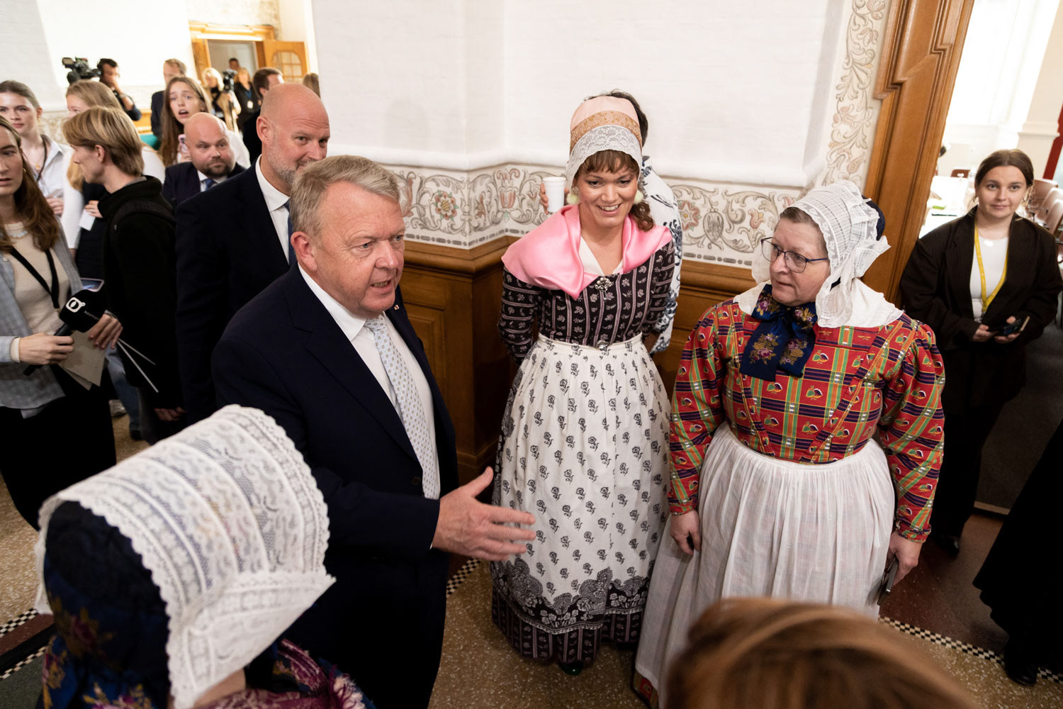 Danish Minister for Foreign Affairs Lars Løkke Rasmussen meets a local folk group on the opening day of the Danish Parliament at Christiansborg Palace, Copenhagen, October 6, 2026 / for NurPhoto Agency