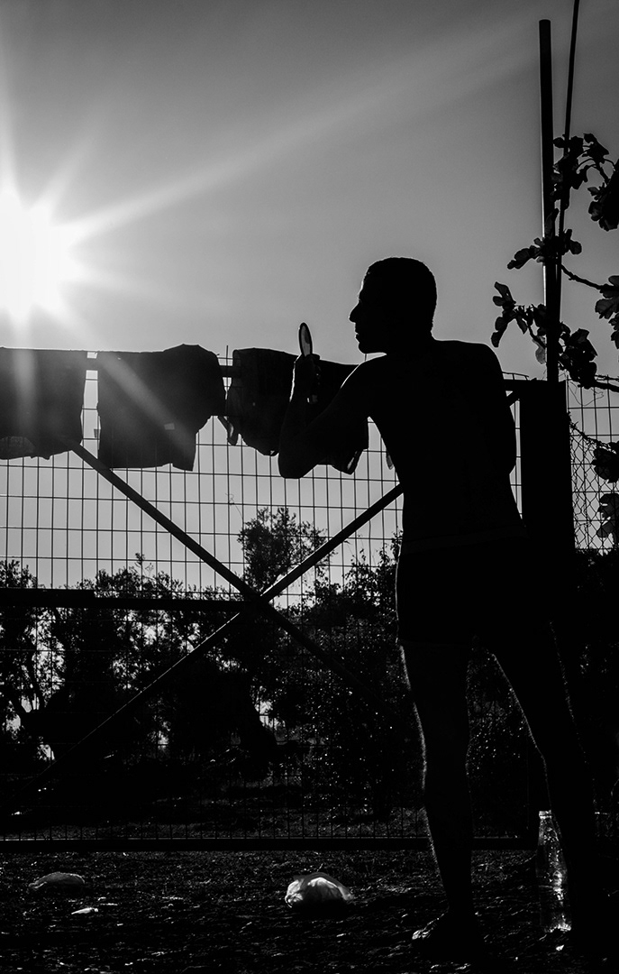 UNKNOWN REFUGEE AFTER SHOWER, MORIA CAMP, LESVOS, GREECE, 2016