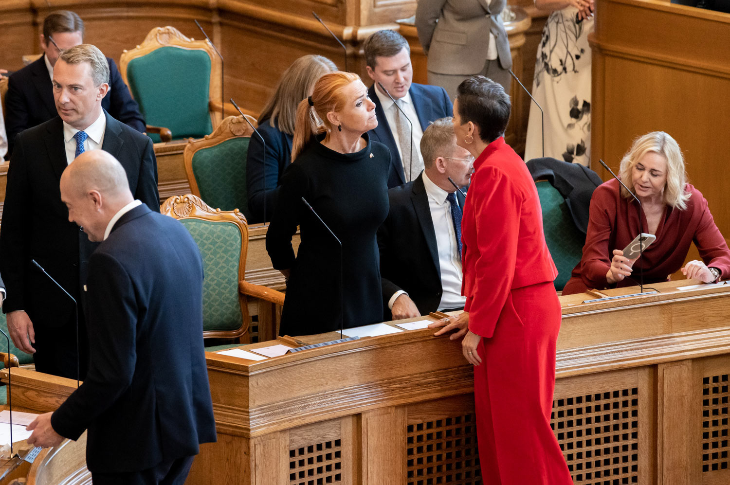 Chair of the Danish Democrats Inger Støjberg speaks with Minister for Economic and Interior Affair Pia Olsen Dyhr the opening day of the Danish Parliament at Christiansborg Palace, October 6, 2026. / for NurPhoto Agency s 