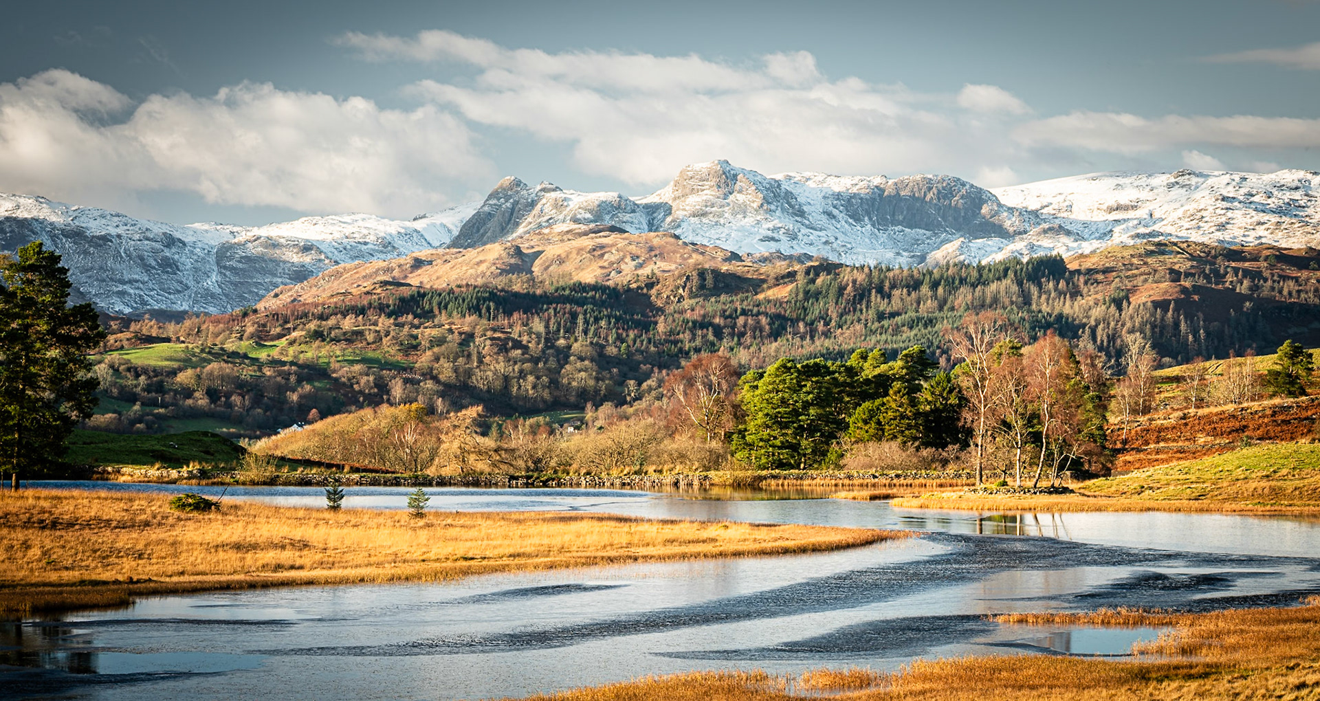 An infinity view of the Langdales from Wise Een Tarn