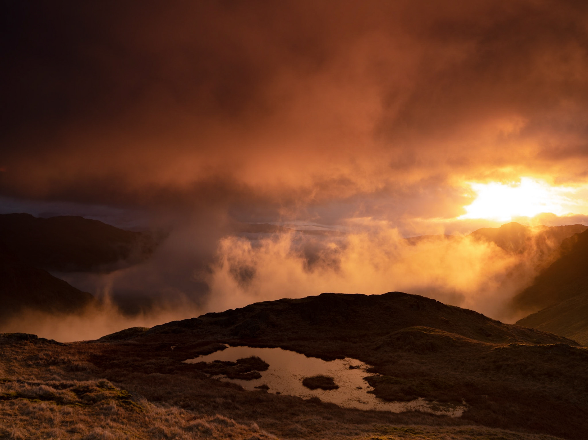 Mist rising out of the Little Langdale valley at sunrise 1