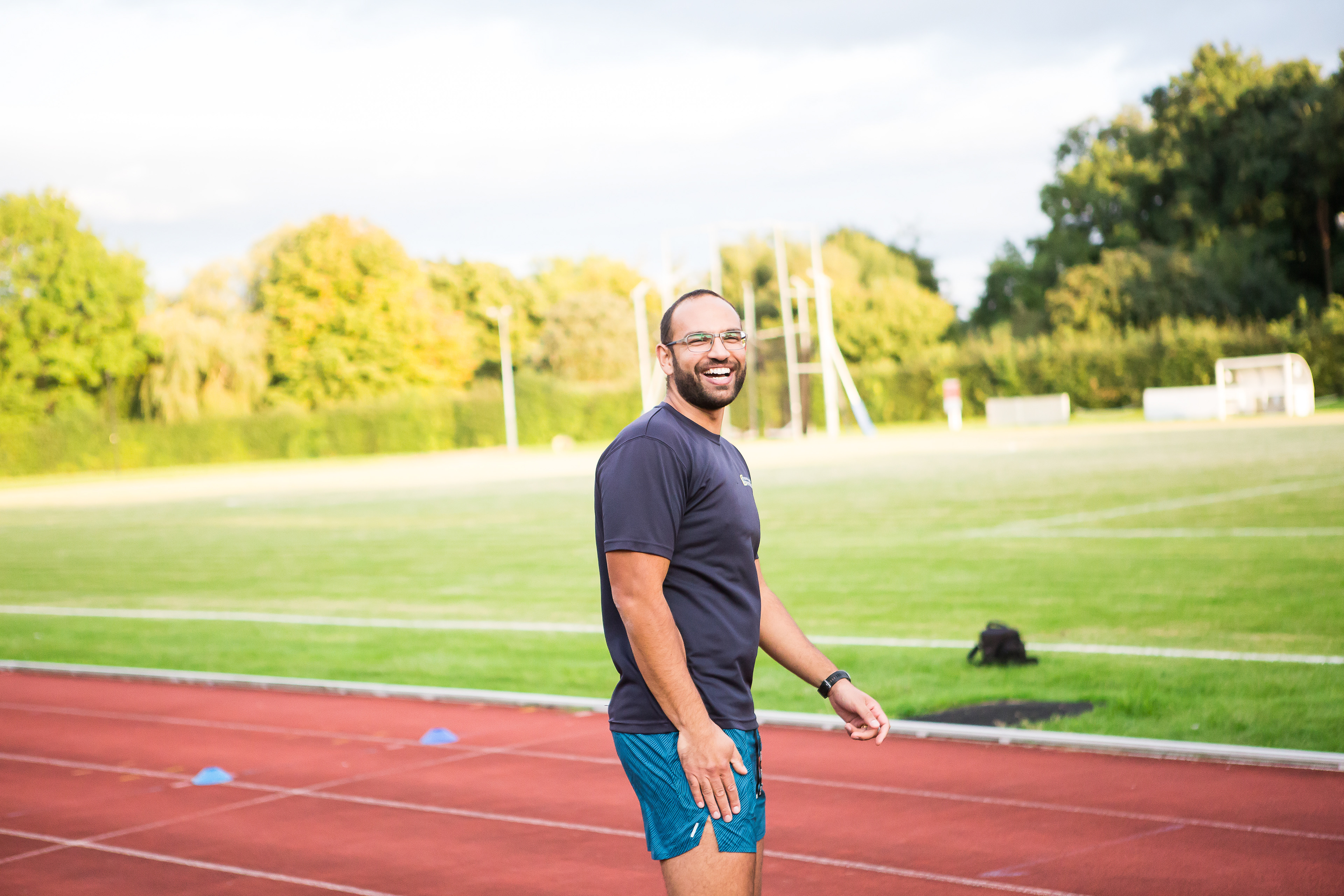 Arj Thiruchelvam Coaching on the athletics track