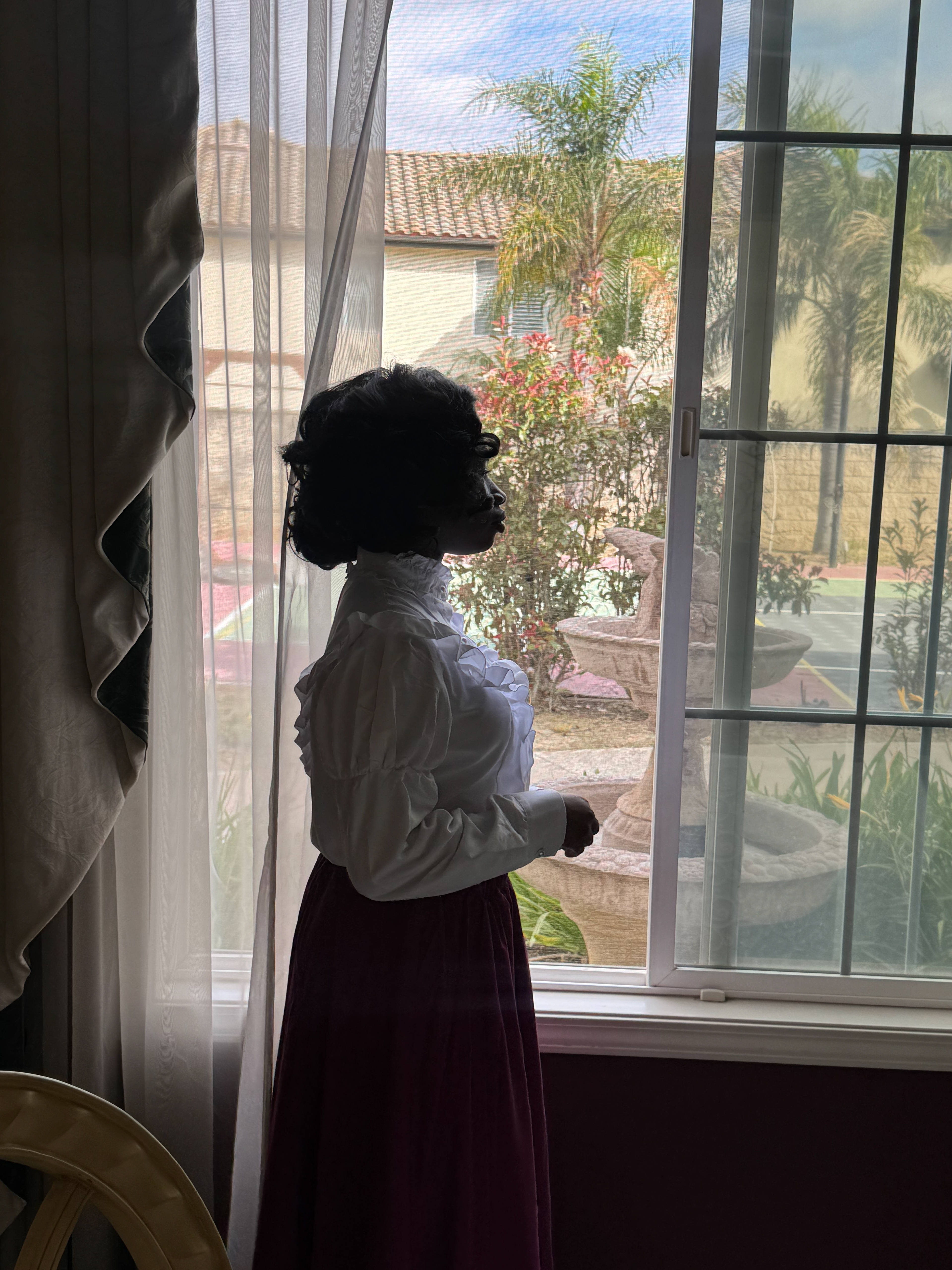 Onset photo of Jas in Little Women costume